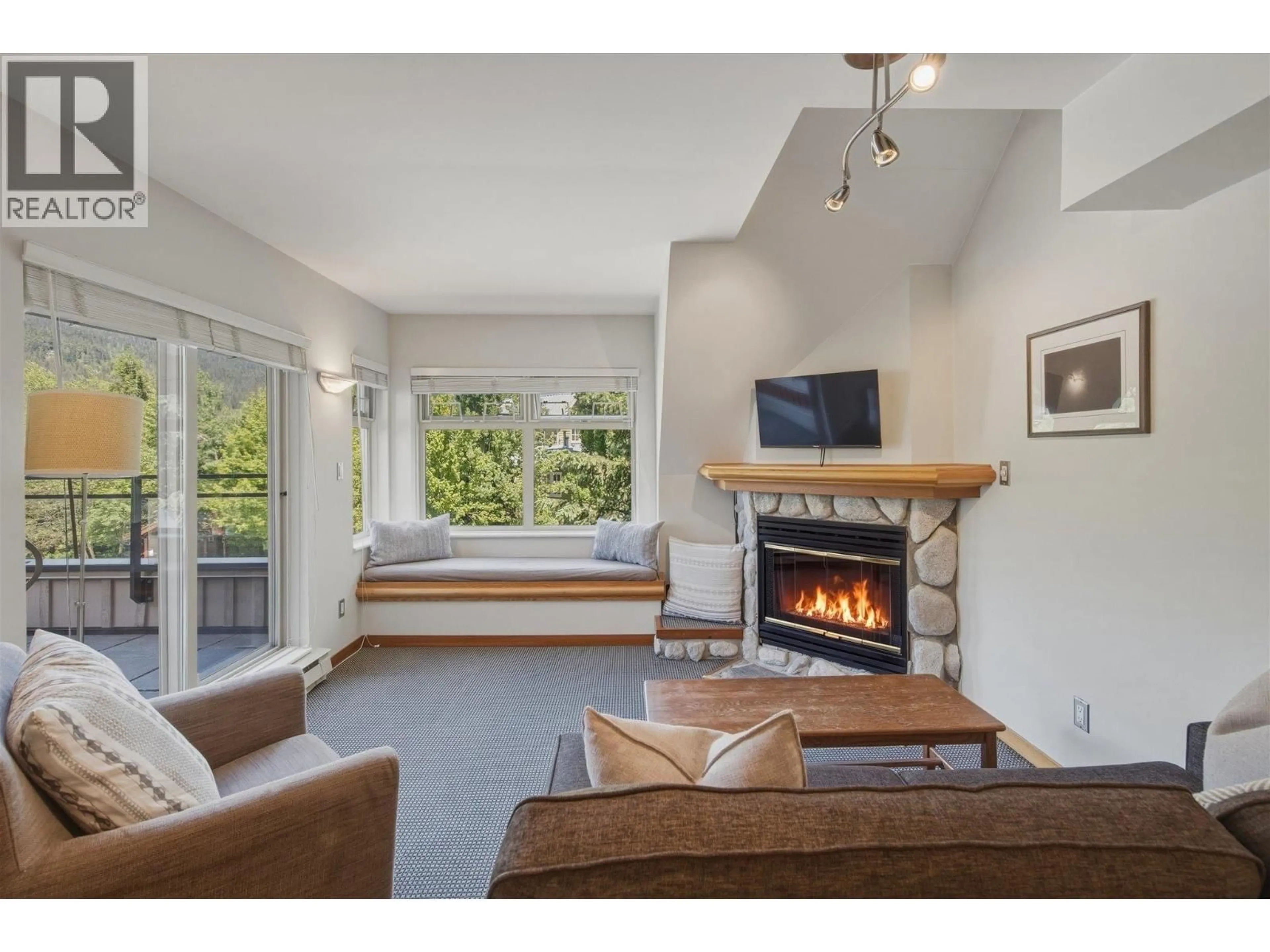 Living room with furniture, unknown for 217 - 2050 LAKE PLACID ROAD, Whistler British Columbia V8E0A8