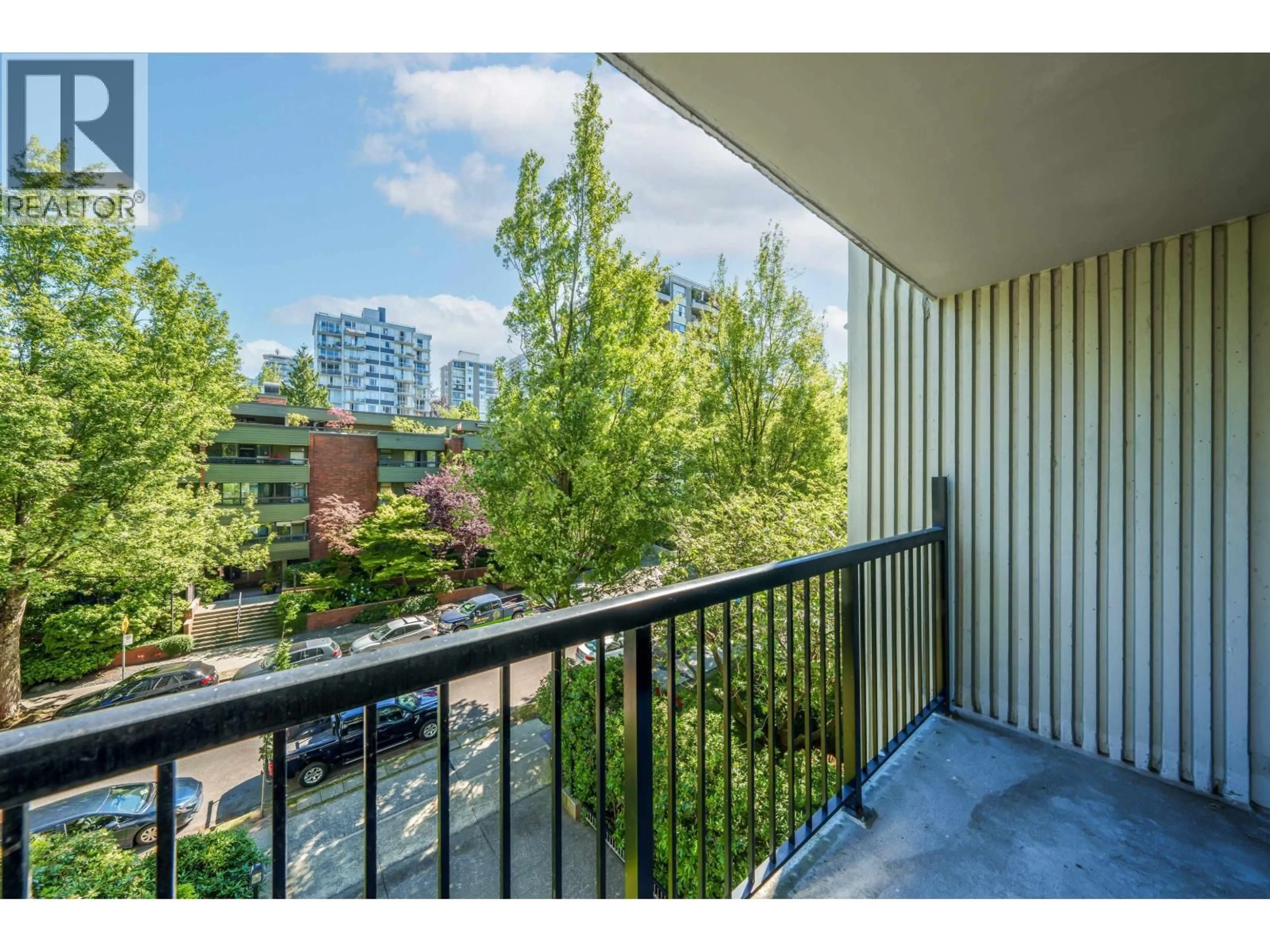 Balcony in the apartment, city buildings view from balcony for 402 - 1330 HARWOOD STREET, Vancouver British Columbia V7V1K9