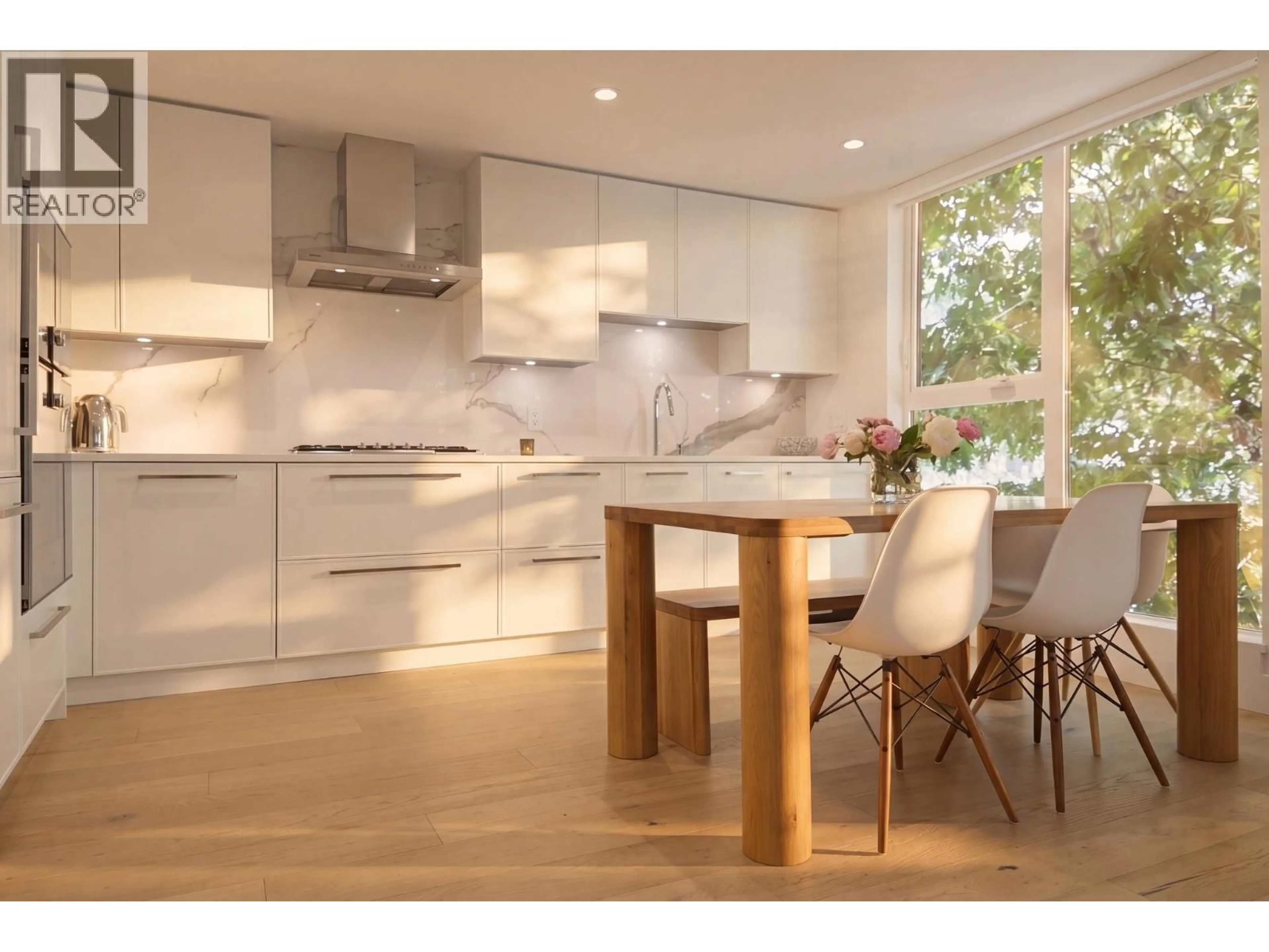 Contemporary kitchen, wood/laminate floor for 306 - 2485 LARCH STREET, Vancouver British Columbia V6K0A3