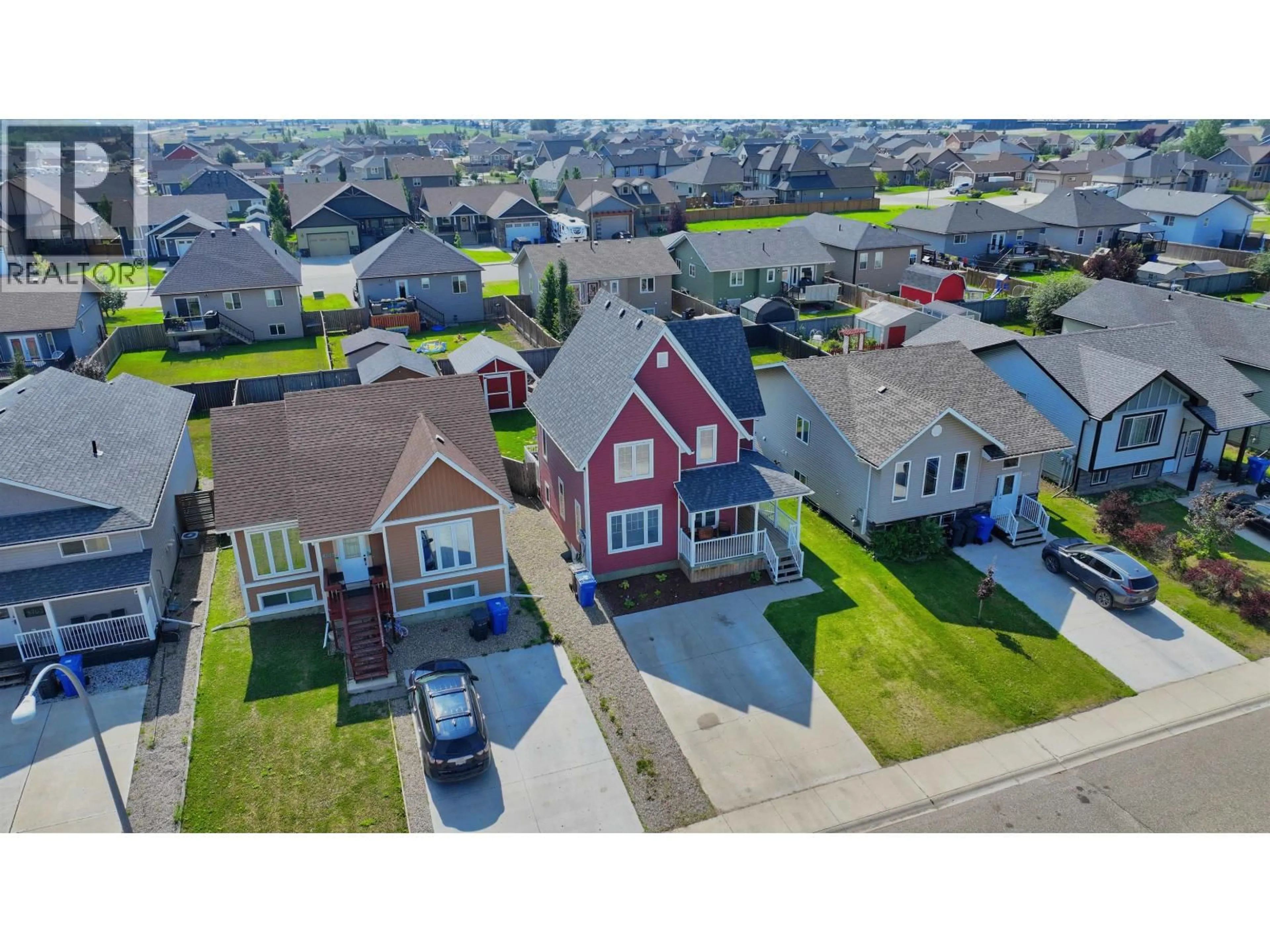 A pic from outside/outdoor area/front of a property/back of a property/a pic from drone, street for 8711 113 AVENUE, Fort St. John British Columbia V1J0E2