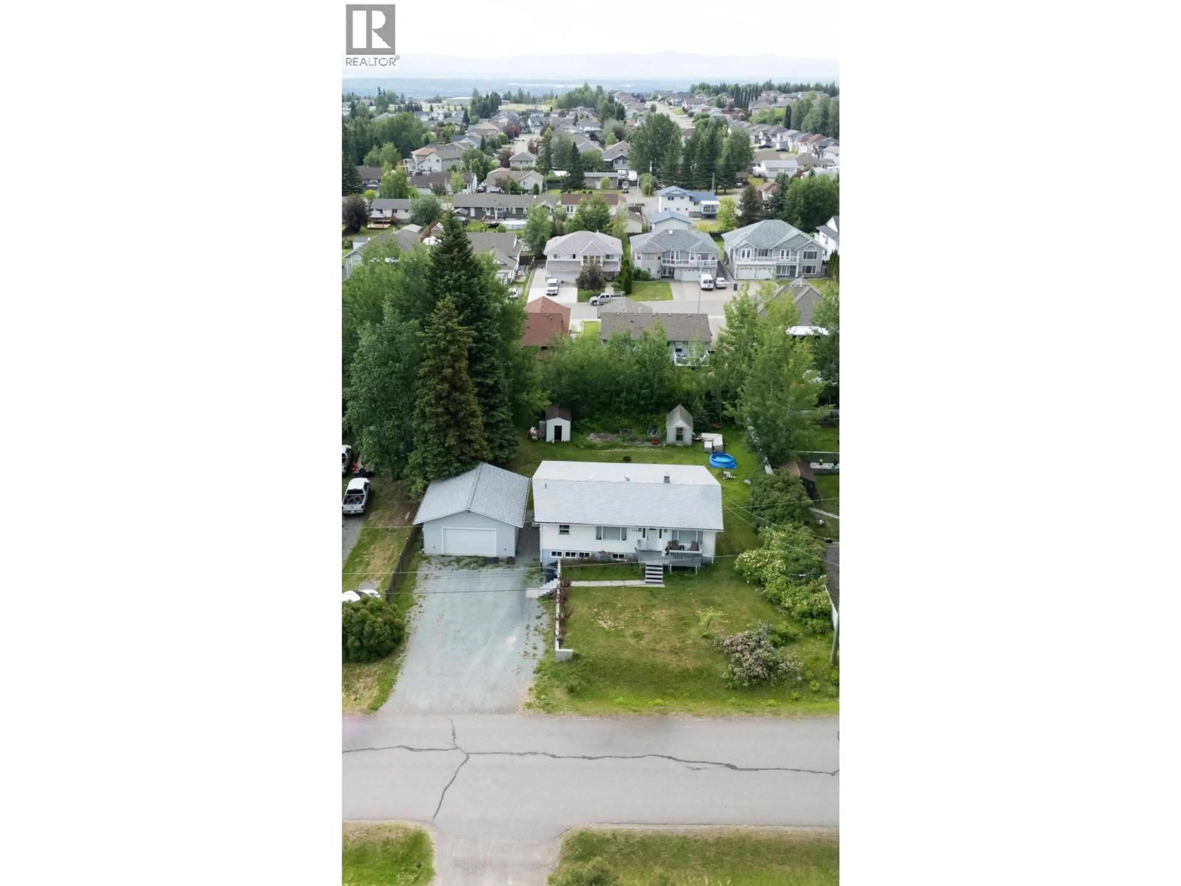 A pic from outside/outdoor area/front of a property/back of a property/a pic from drone, mountain view for 6986 TONY ROAD, Prince George British Columbia V2N5P4