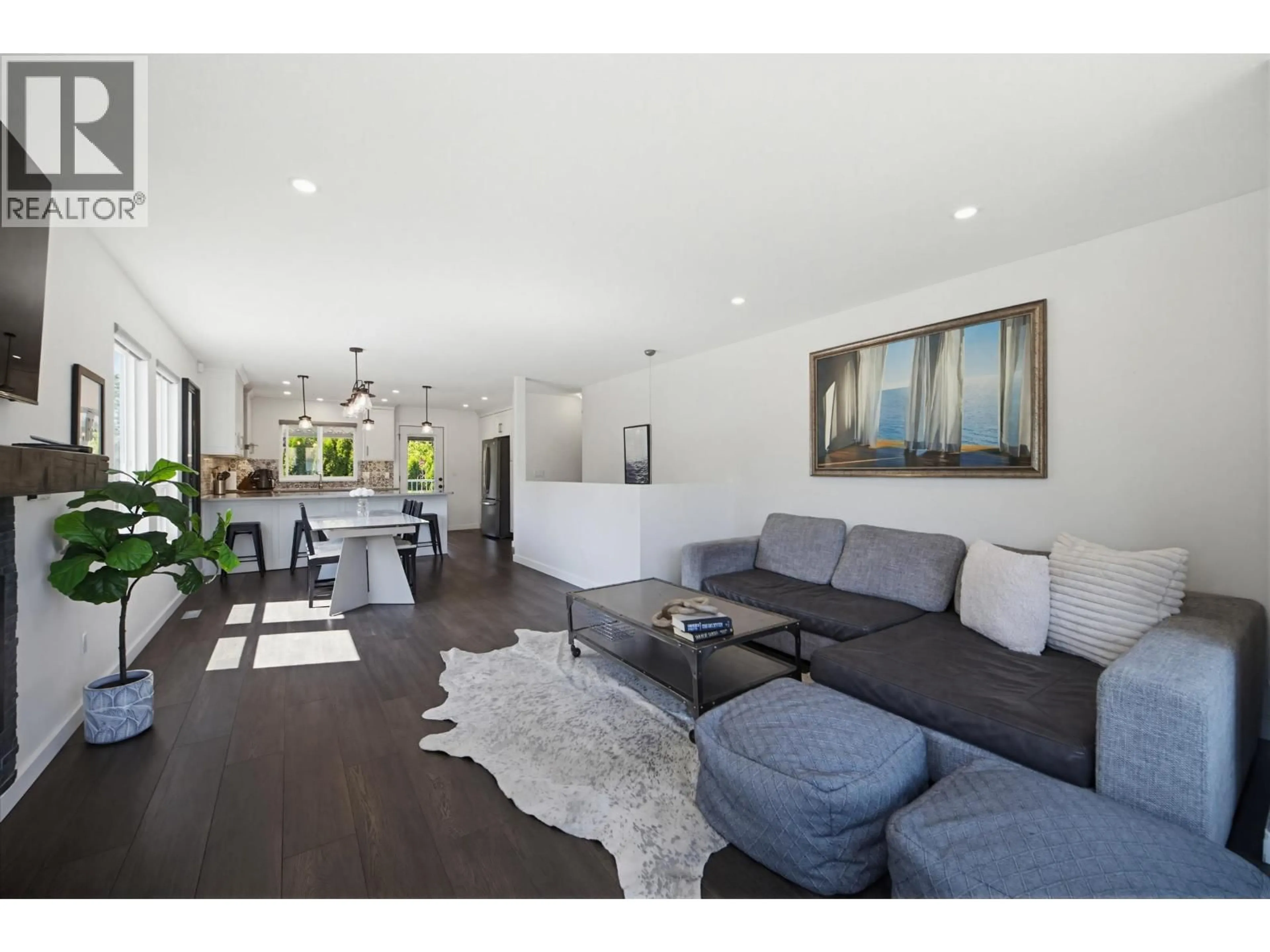 Living room with furniture, wood/laminate floor for 12477 230 STREET, Maple Ridge British Columbia V2X0X2