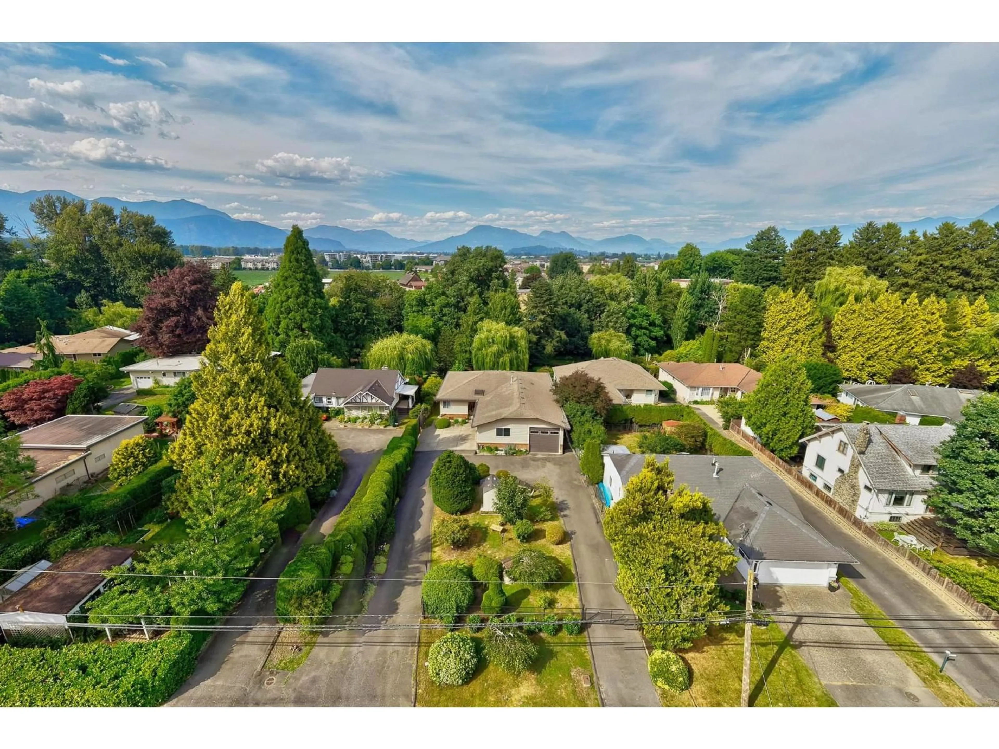A pic from outside/outdoor area/front of a property/back of a property/a pic from drone, mountain view for 45549 WELLS ROAD, Chilliwack British Columbia V2R1G6