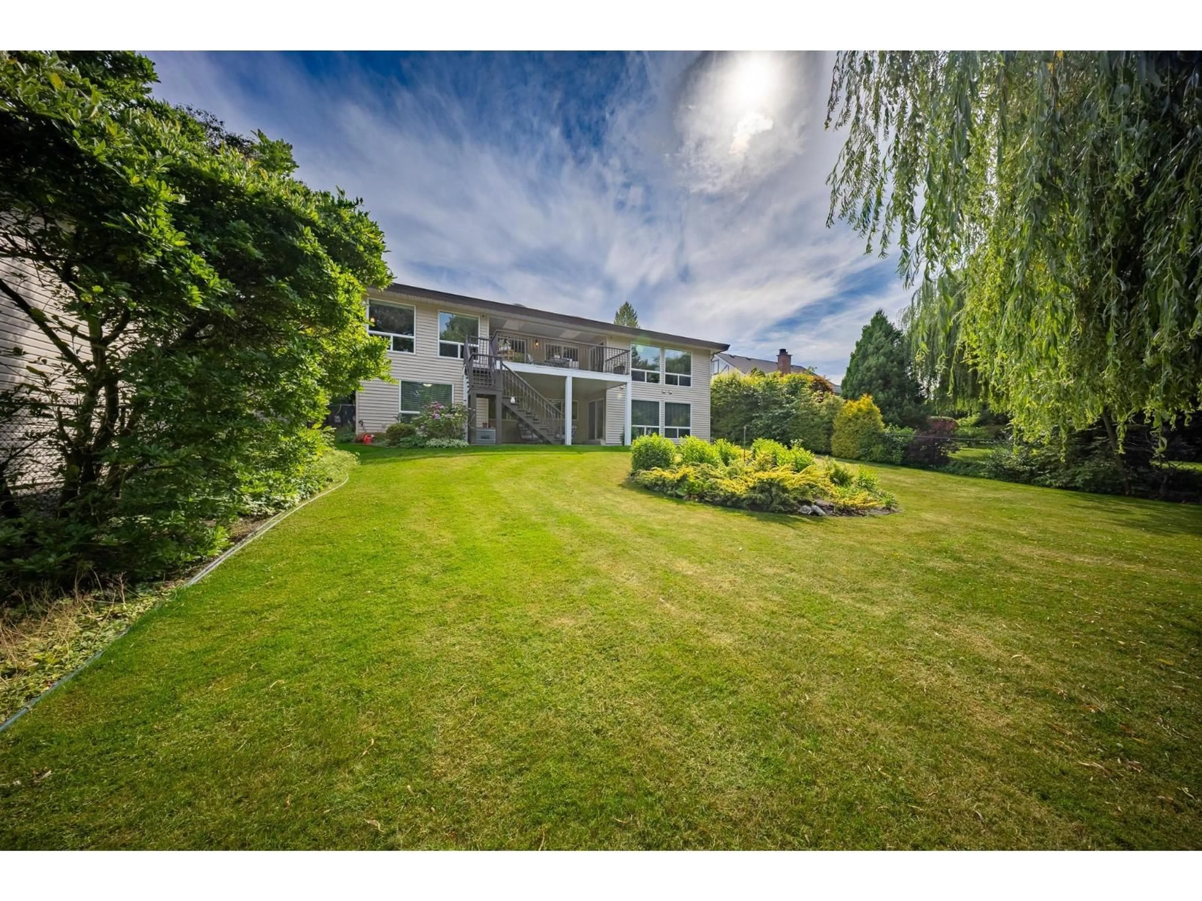 A pic from outside/outdoor area/front of a property/back of a property/a pic from drone, unknown for 45549 WELLS ROAD, Chilliwack British Columbia V2R1G6