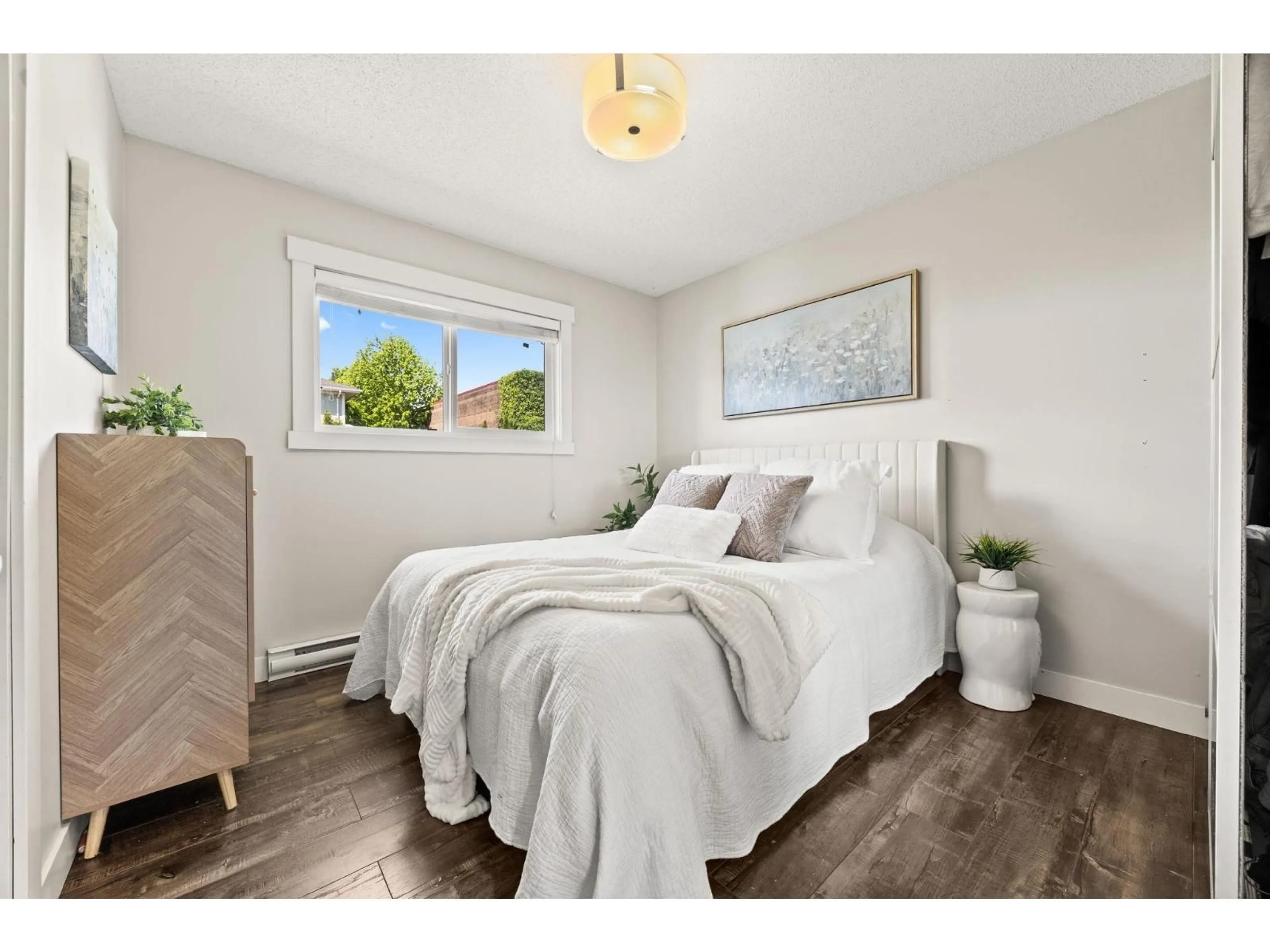 Bedroom with bed, wood/laminate floor for 26451 30A AVENUE, Langley British Columbia V4W3E1