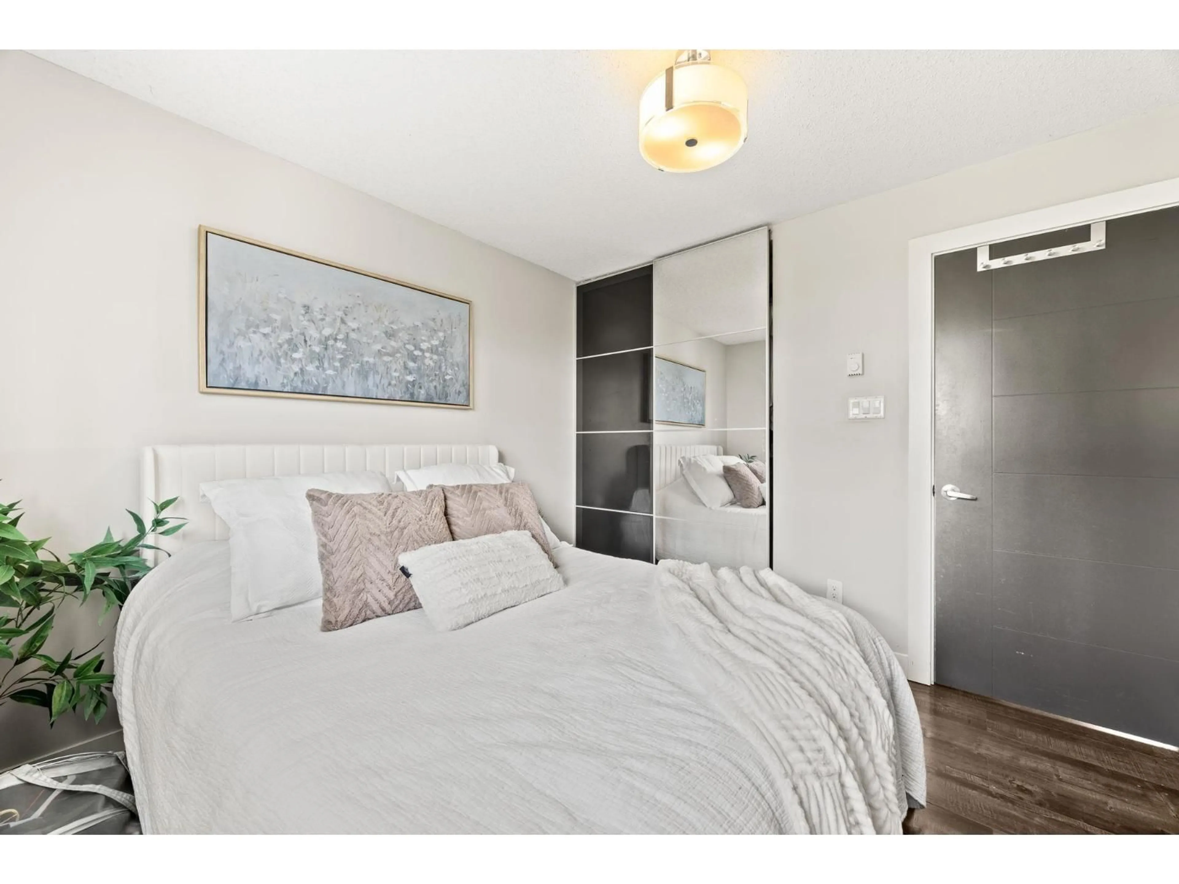 Bedroom with bed, wood/laminate floor for 26451 30A AVENUE, Langley British Columbia V4W3E1