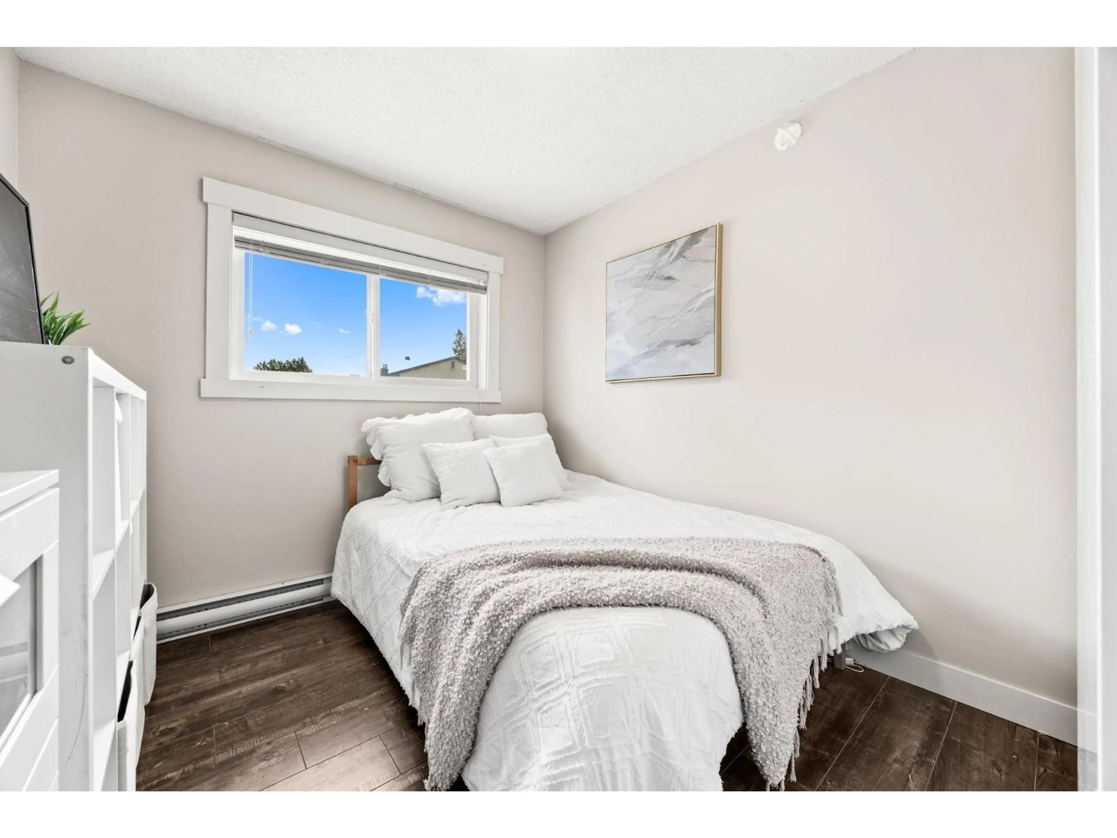 Bedroom with bed, wood/laminate floor for 26451 30A AVENUE, Langley British Columbia V4W3E1
