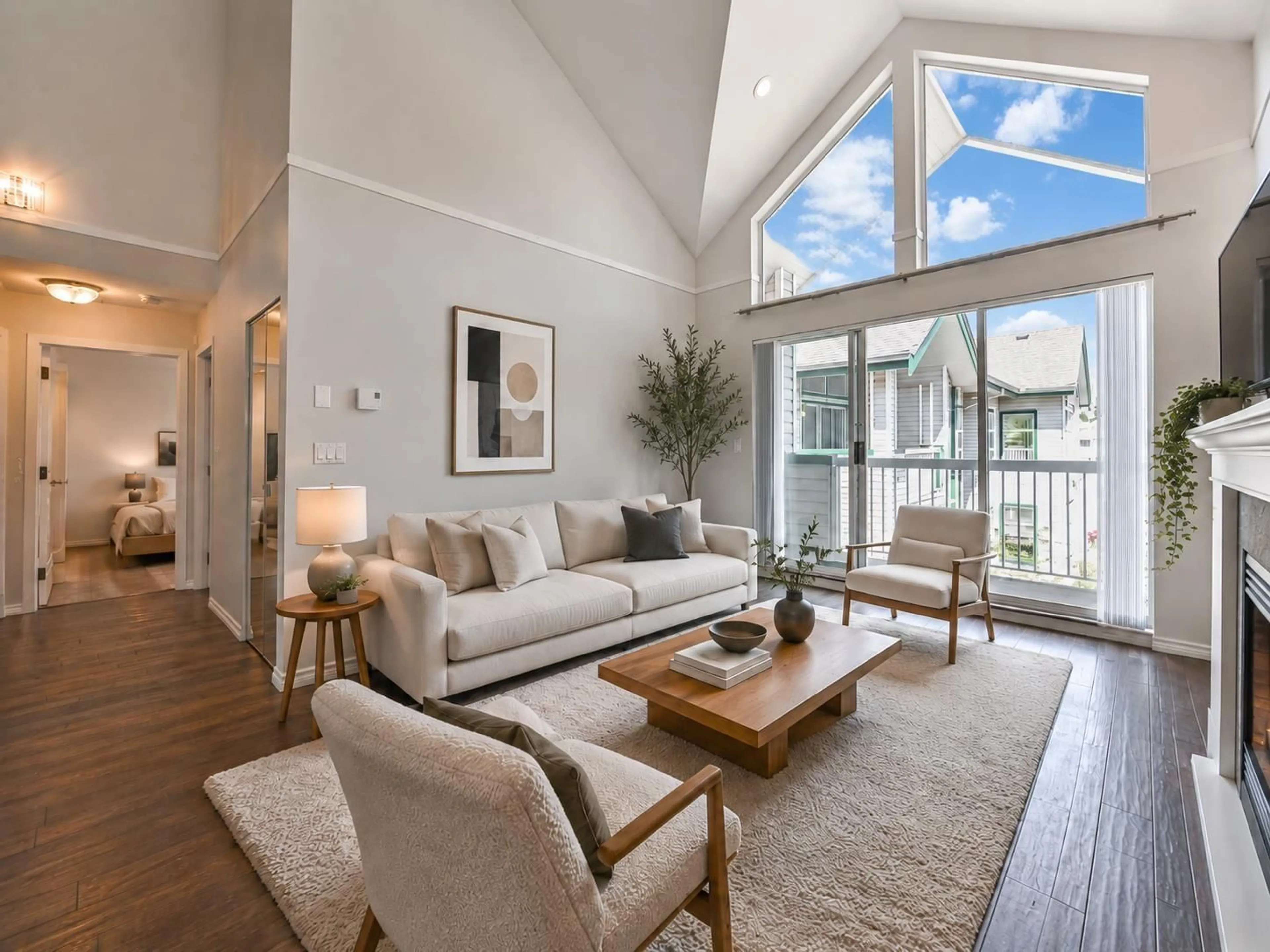 Living room with furniture, wood/laminate floor for 320 - 13911 70 AVENUE, Surrey British Columbia V3W6B4