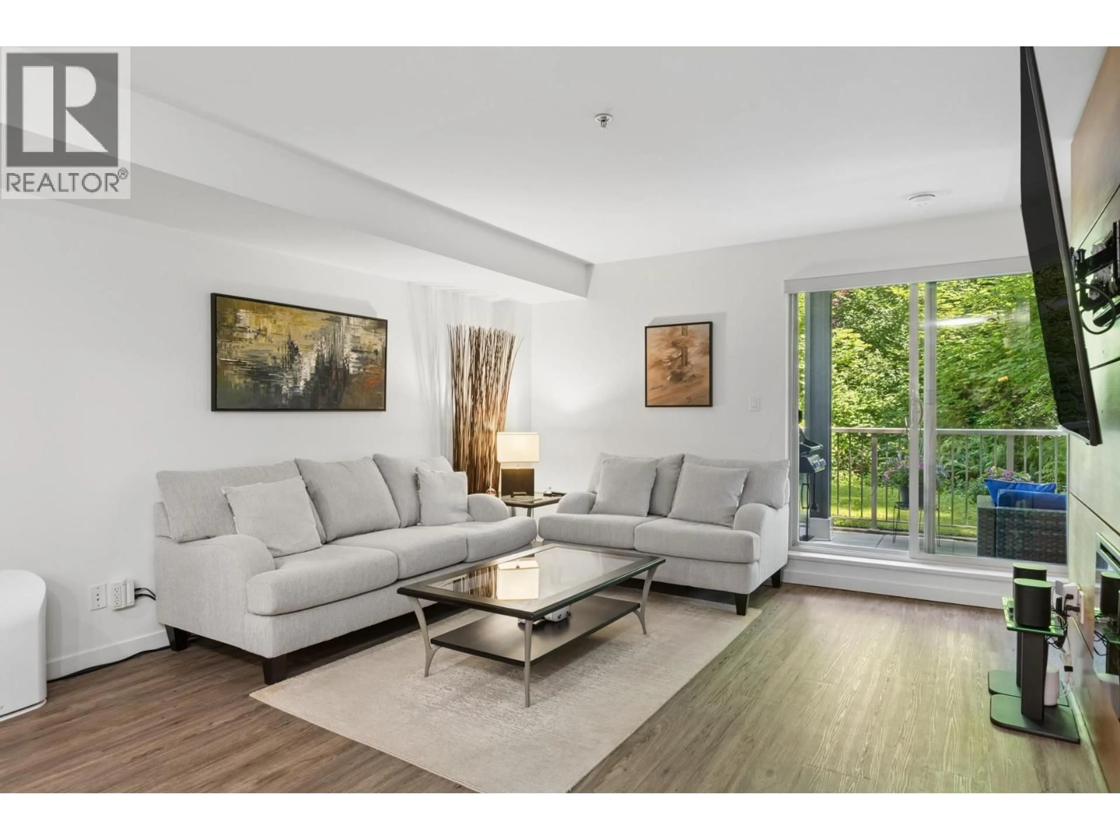 Living room with furniture, unknown for 102 - 2832 CAPILANO ROAD, North Vancouver British Columbia V7R4H5