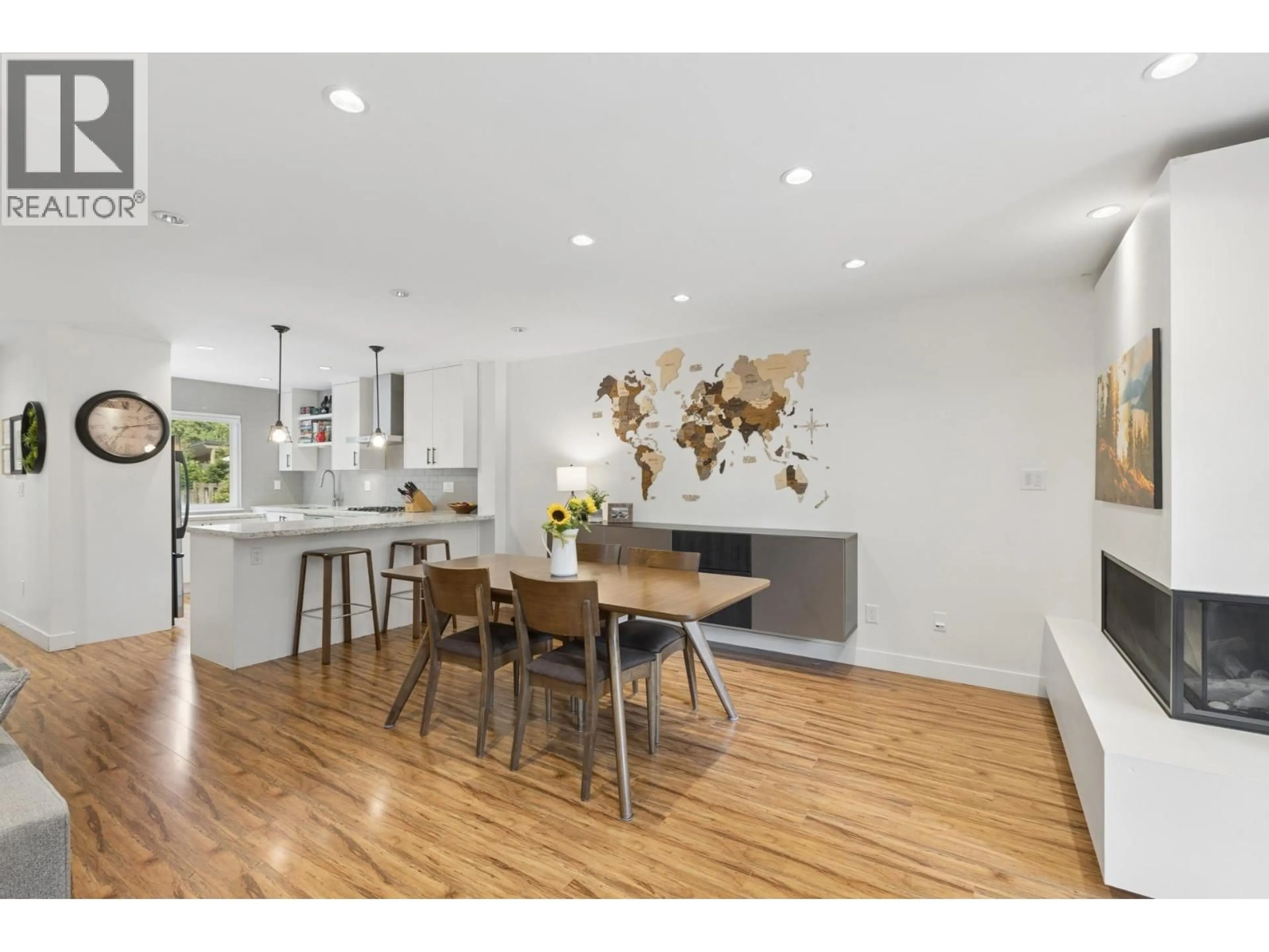 Open concept kitchen, wood/laminate floor for 4715 HOSKINS ROAD, North Vancouver British Columbia V7K2R3