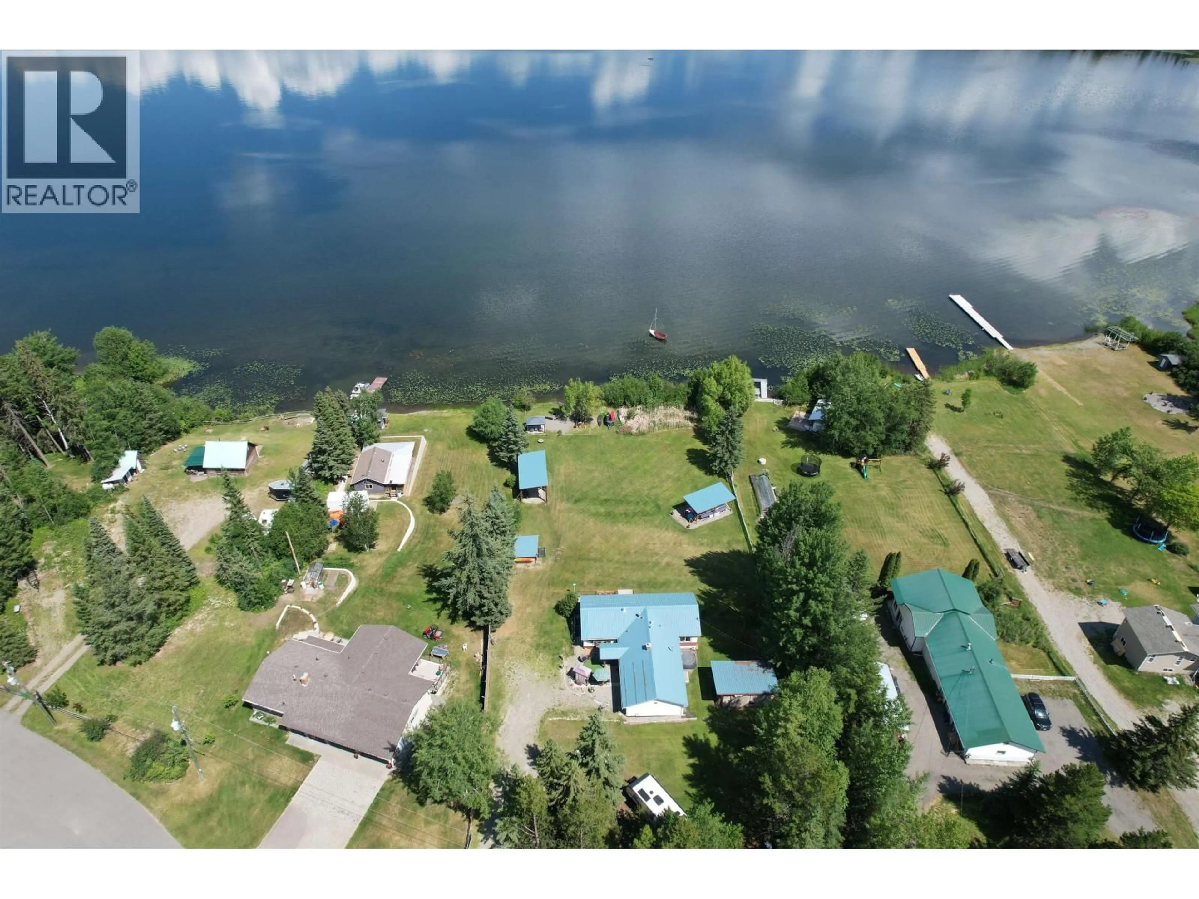 A pic from outside/outdoor area/front of a property/back of a property/a pic from drone, water/lake/river/ocean view for 4856 TEN MILE LAKE ROAD, Quesnel British Columbia V2J6X1