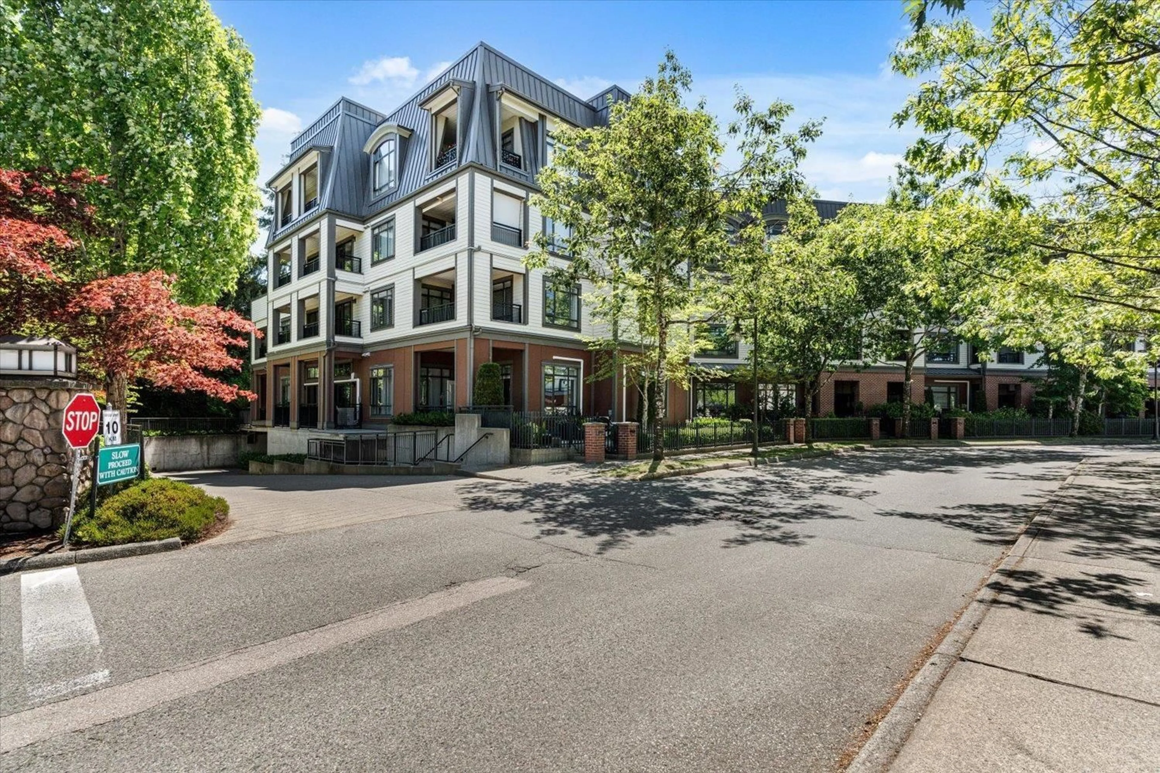 A pic from outside/outdoor area/front of a property/back of a property/a pic from drone, street for 112 - 8880 202 STREET, Langley British Columbia V1M4E7