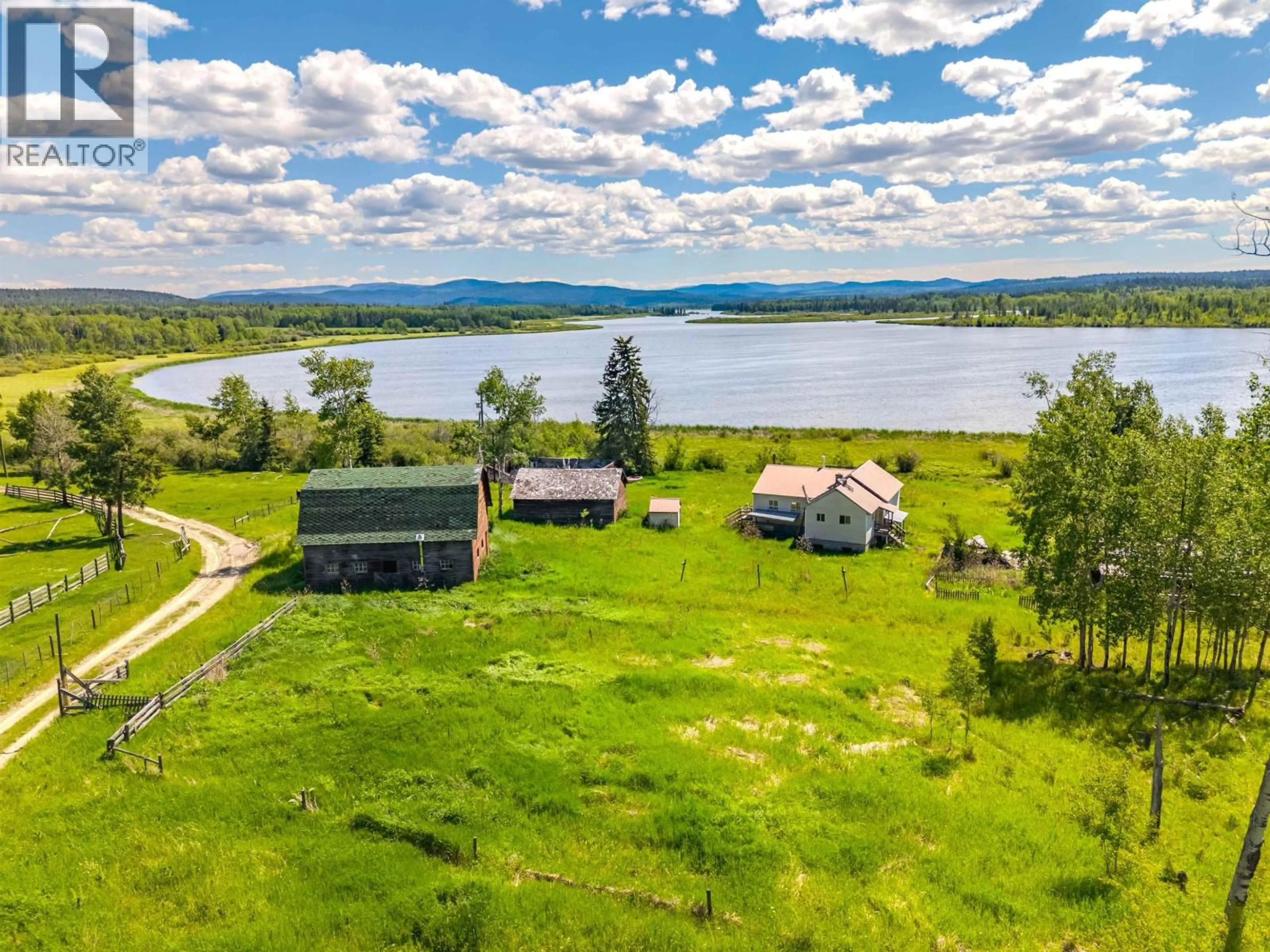 A pic from outside/outdoor area/front of a property/back of a property/a pic from drone, water/lake/river/ocean view for 6442 BUFFALO CREEK ROAD, 100 Mile House British Columbia V1K1G0