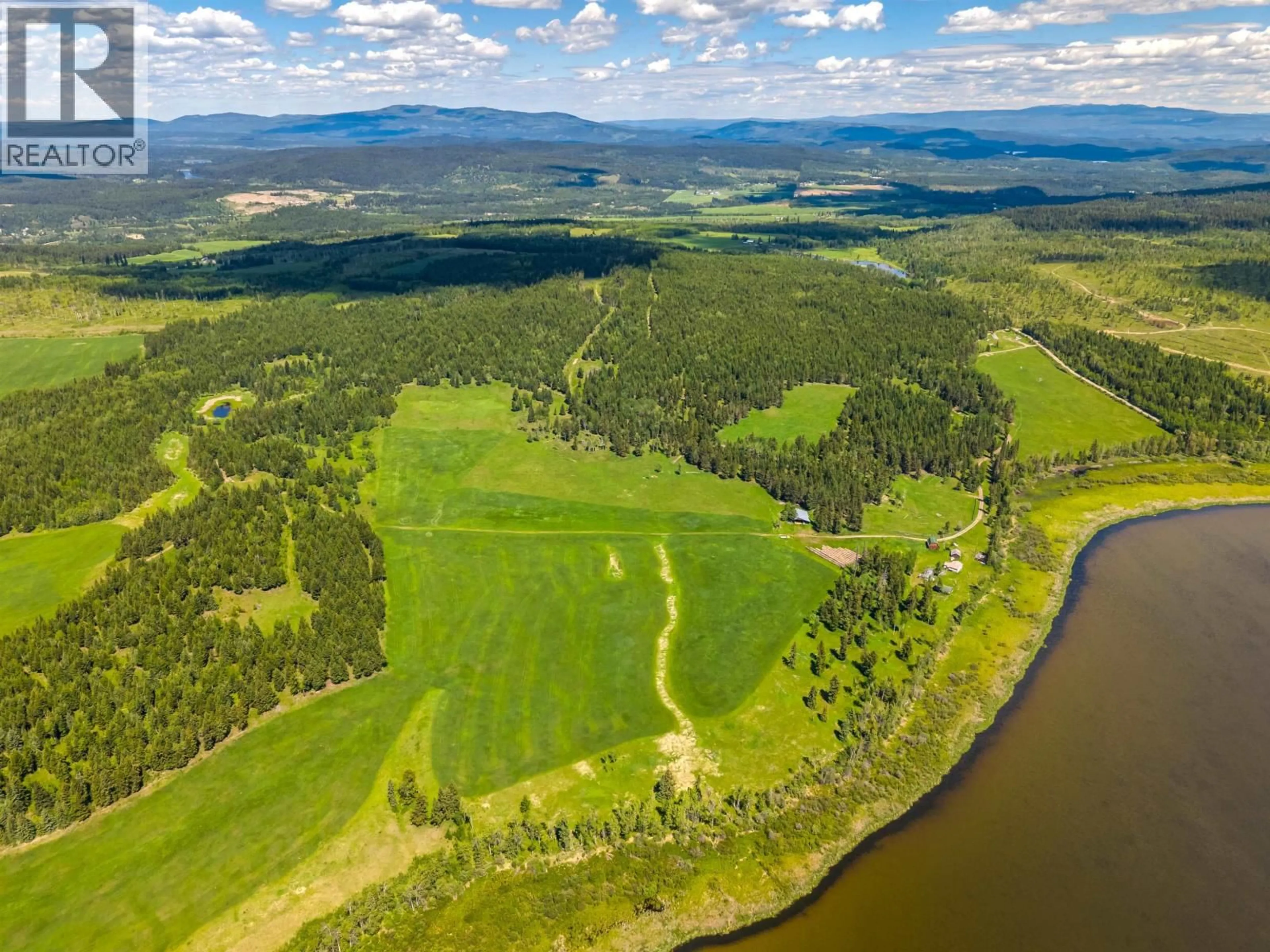 A pic from outside/outdoor area/front of a property/back of a property/a pic from drone, water/lake/river/ocean view for 6442 BUFFALO CREEK ROAD, 100 Mile House British Columbia V1K1G0