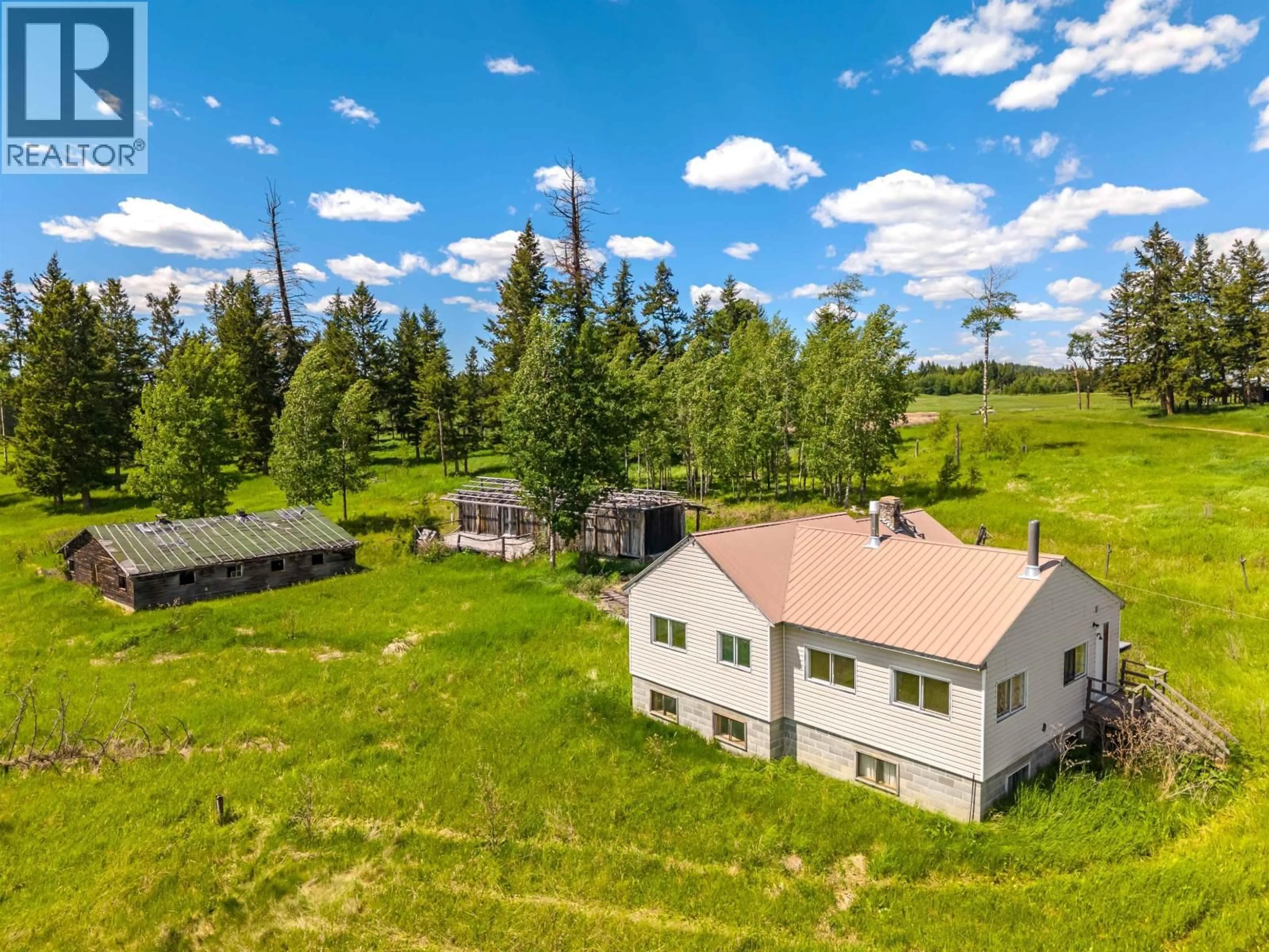 A pic from outside/outdoor area/front of a property/back of a property/a pic from drone, mountain view for 6442 BUFFALO CREEK ROAD, 100 Mile House British Columbia V1K1G0