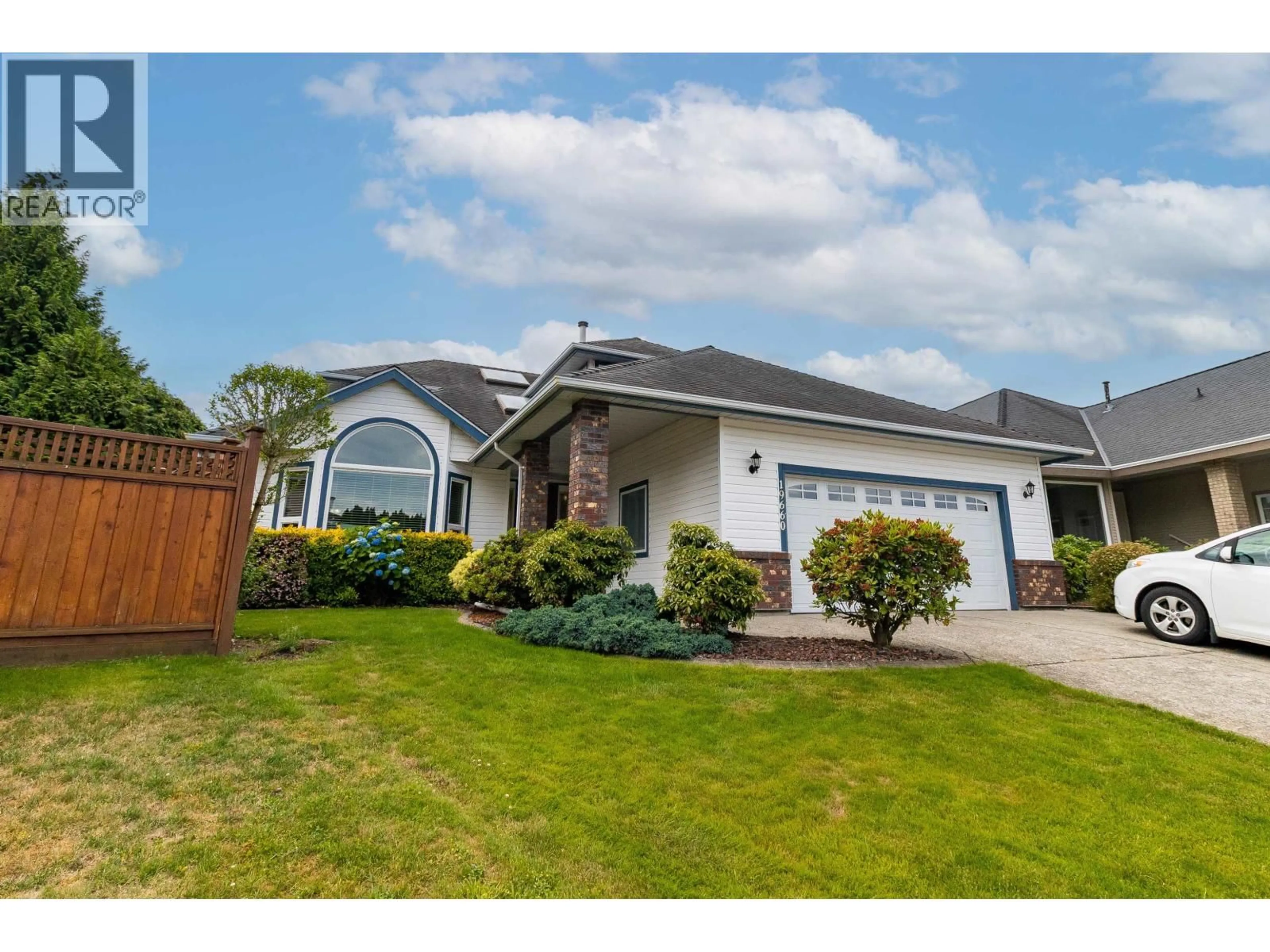 Home with vinyl exterior material, street for 19660 CEDAR LANE, Pitt Meadows British Columbia V3Y2E4