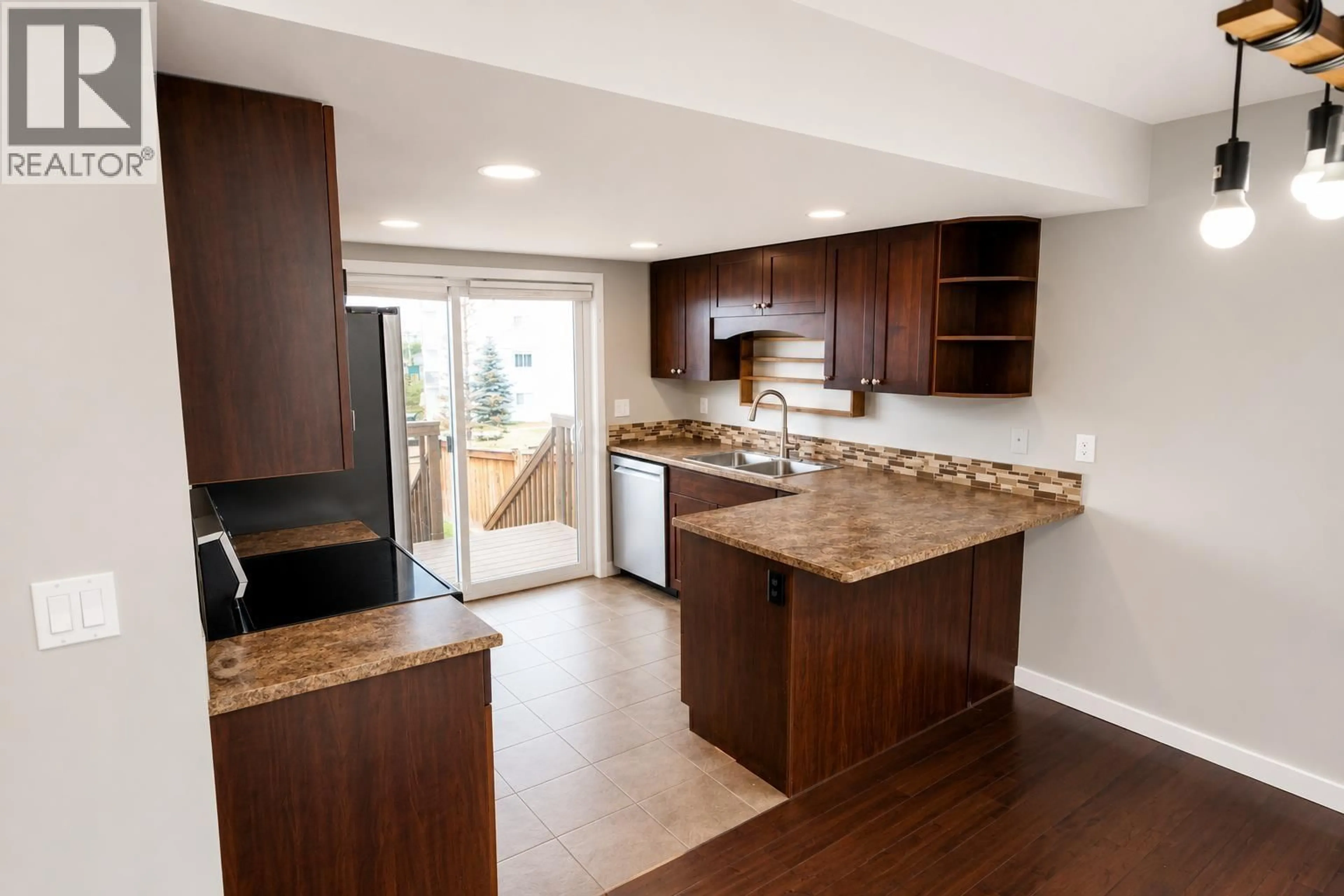 Open concept kitchen, unknown for 8506 85 STREET, Fort St. John British Columbia V1J0G5