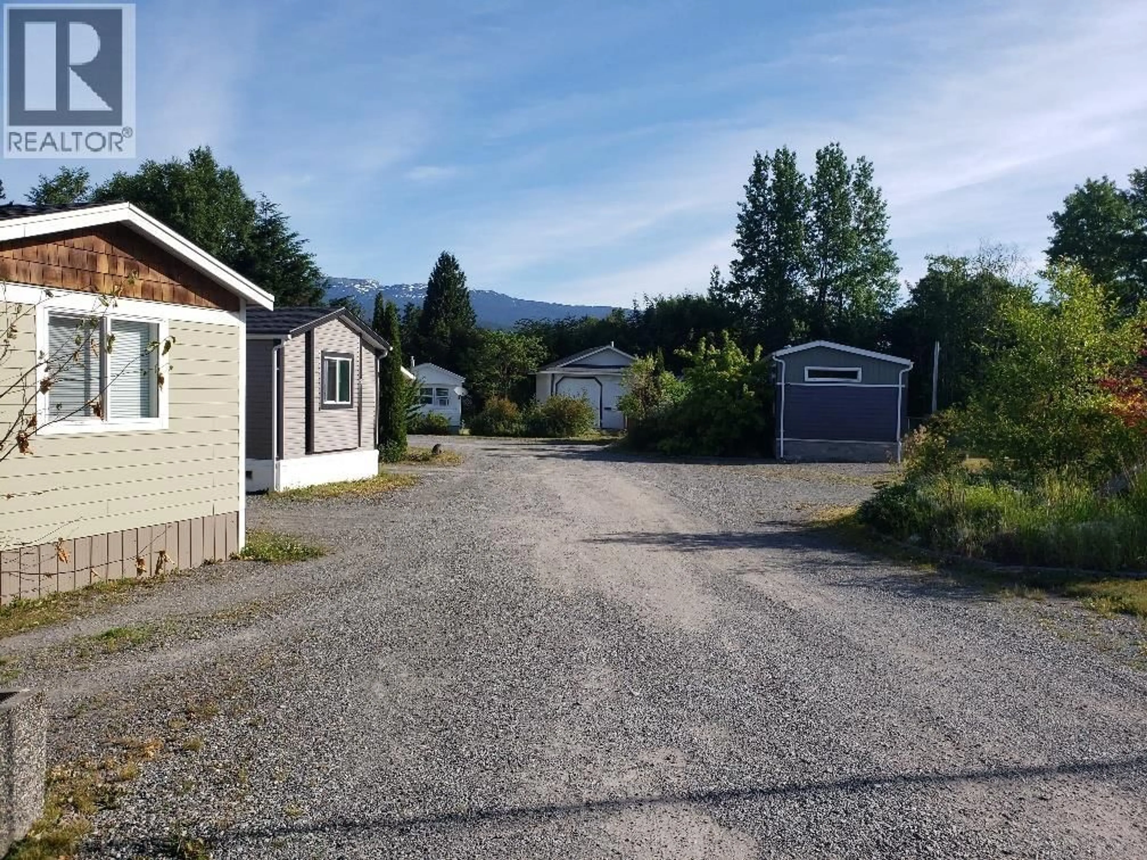 A pic from outside/outdoor area/front of a property/back of a property/a pic from drone, mountain view for 3886 MULLER AVENUE, Terrace British Columbia V8G3T8