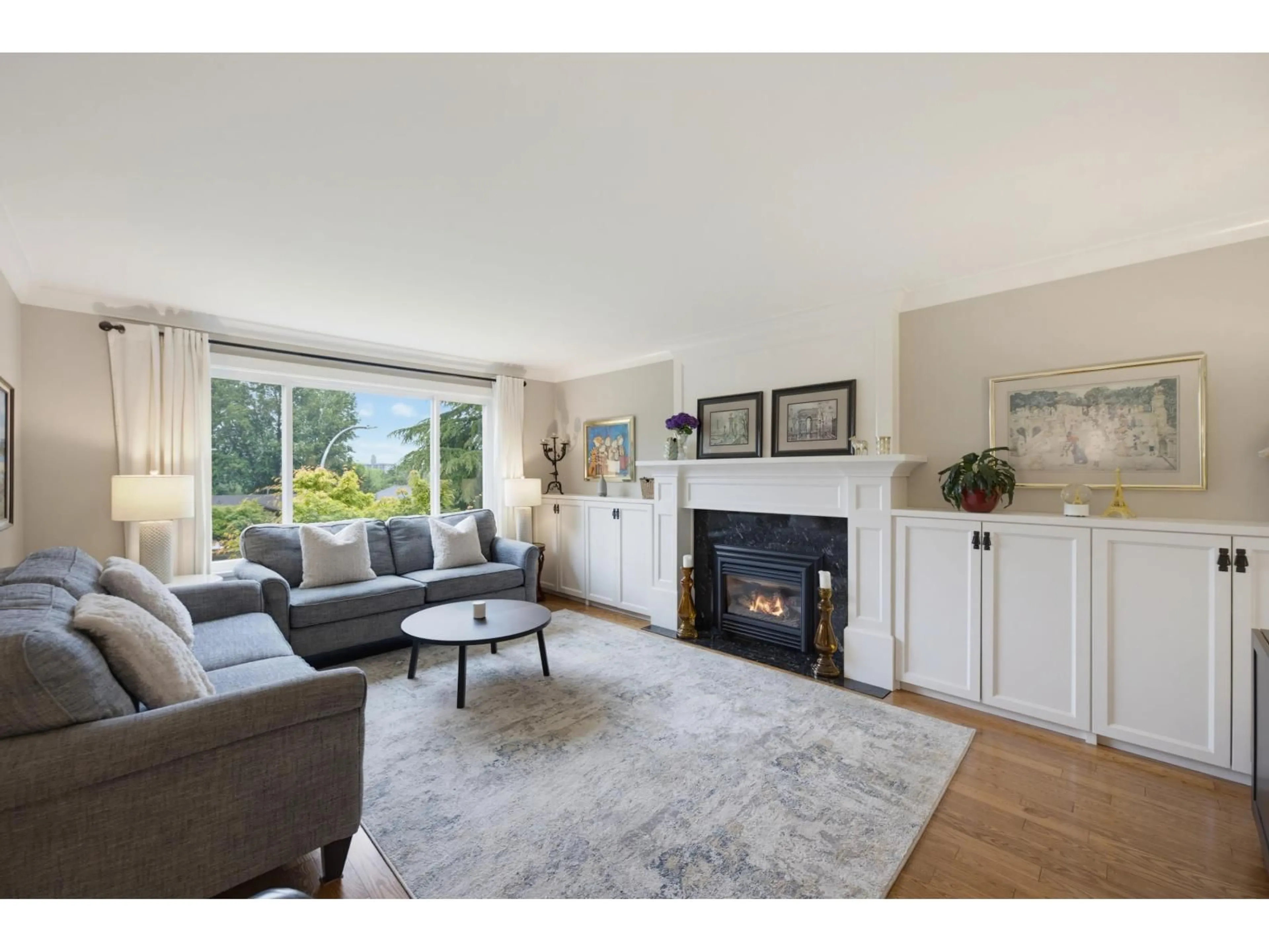 Living room with furniture, wood/laminate floor for 19978 50A AVENUE, Langley British Columbia V3A6S1