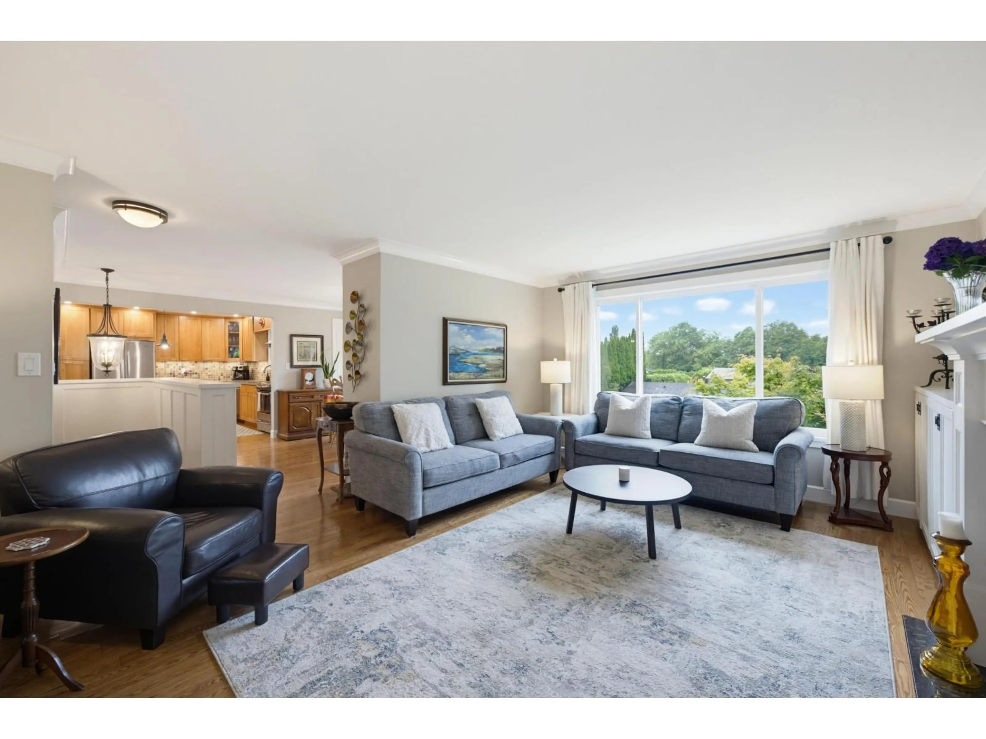 Living room with furniture, wood/laminate floor for 19978 50A AVENUE, Langley British Columbia V3A6S1