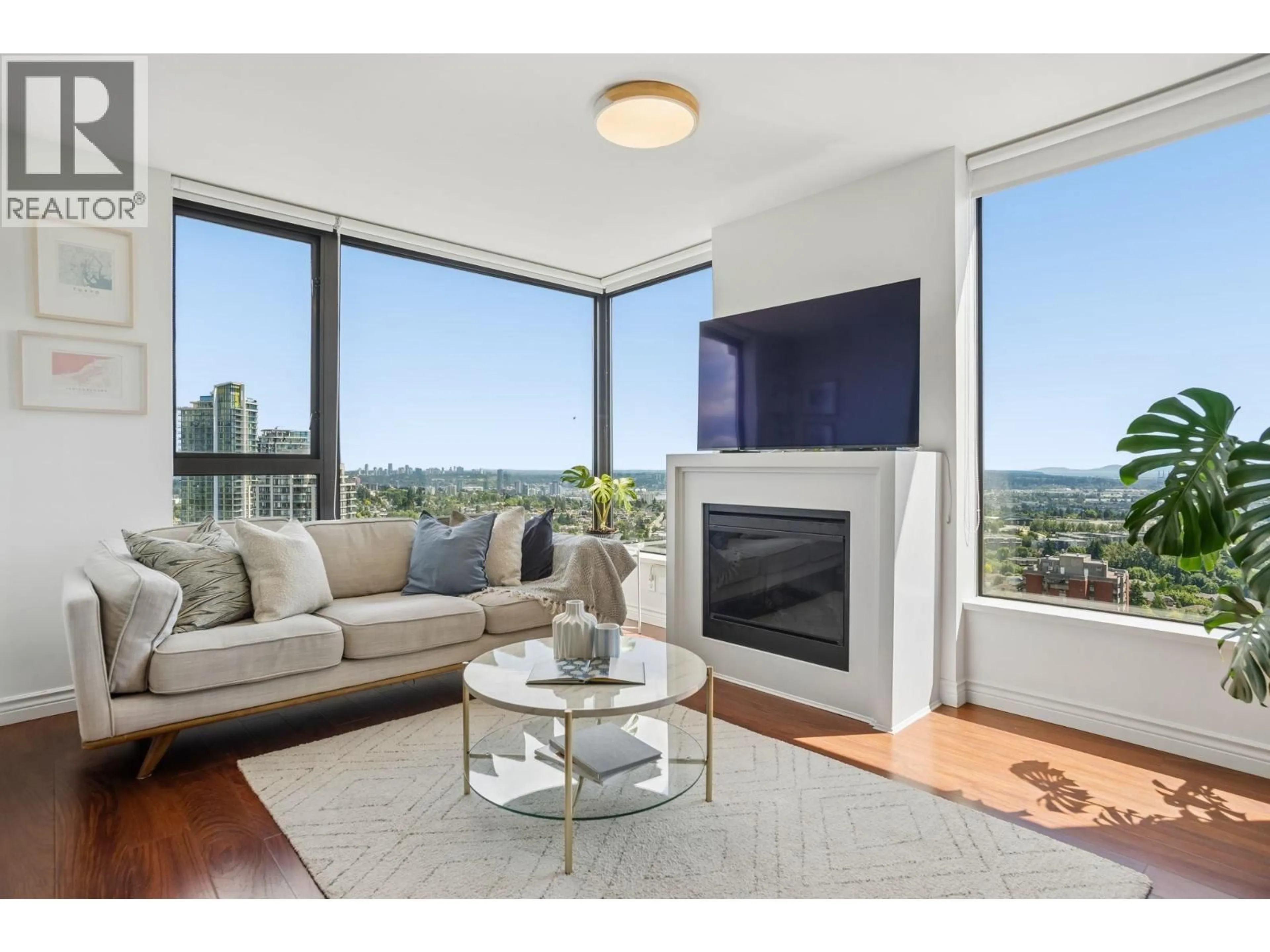 Living room with furniture, wood/laminate floor for 2706 - 7063 HALL AVENUE, Burnaby British Columbia V5E0A5