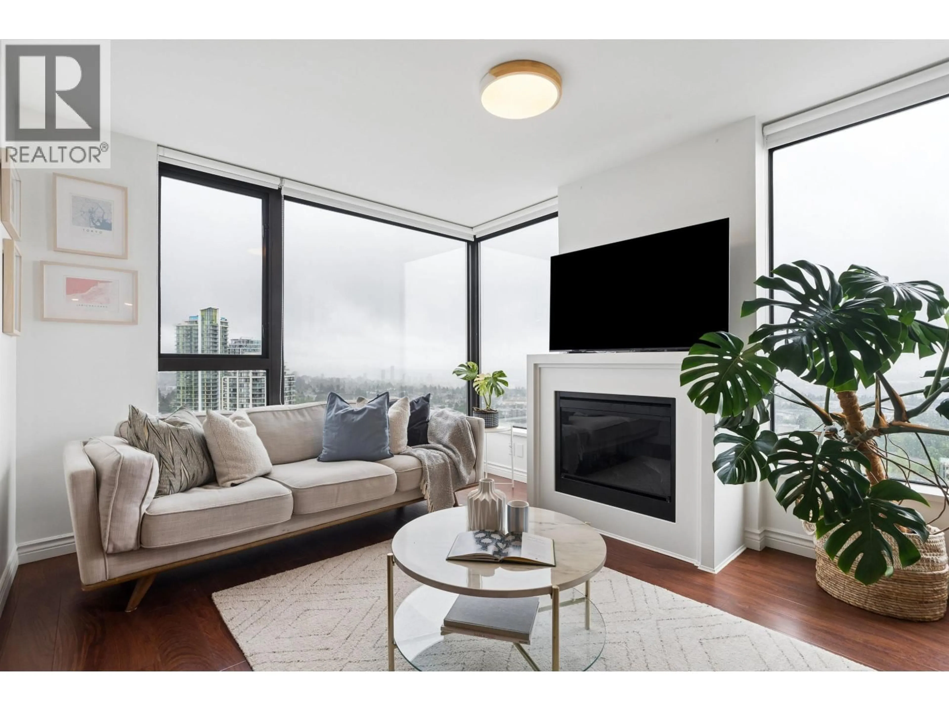 Living room with furniture, wood/laminate floor for 2706 - 7063 HALL AVENUE, Burnaby British Columbia V5E0A5