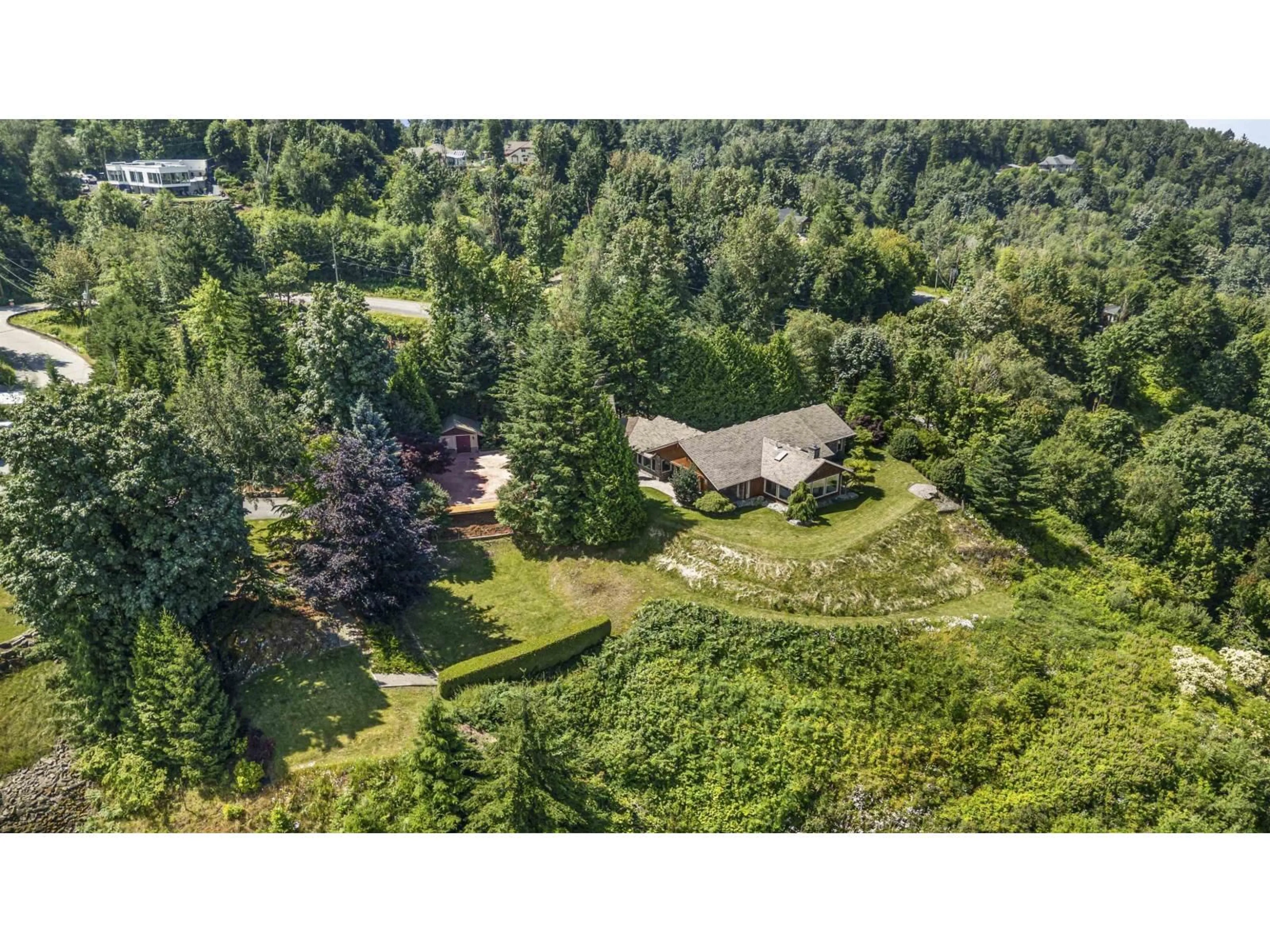 A pic from outside/outdoor area/front of a property/back of a property/a pic from drone, forest/trees view for 8451 GOOSEBERRY PLACE, Chilliwack British Columbia V2R4A3