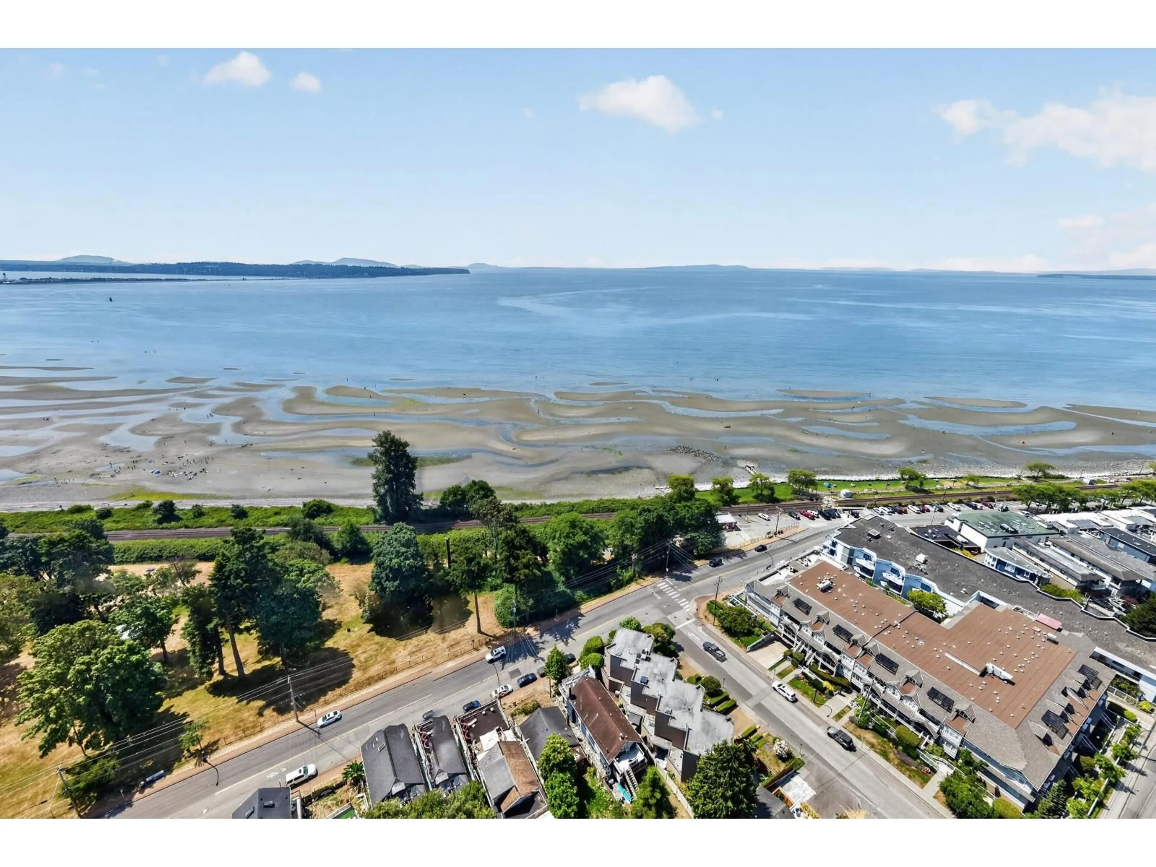 A pic from outside/outdoor area/front of a property/back of a property/a pic from drone, water/lake/river/ocean view for 15667 MARINE DRIVE, White Rock British Columbia V4B1E3