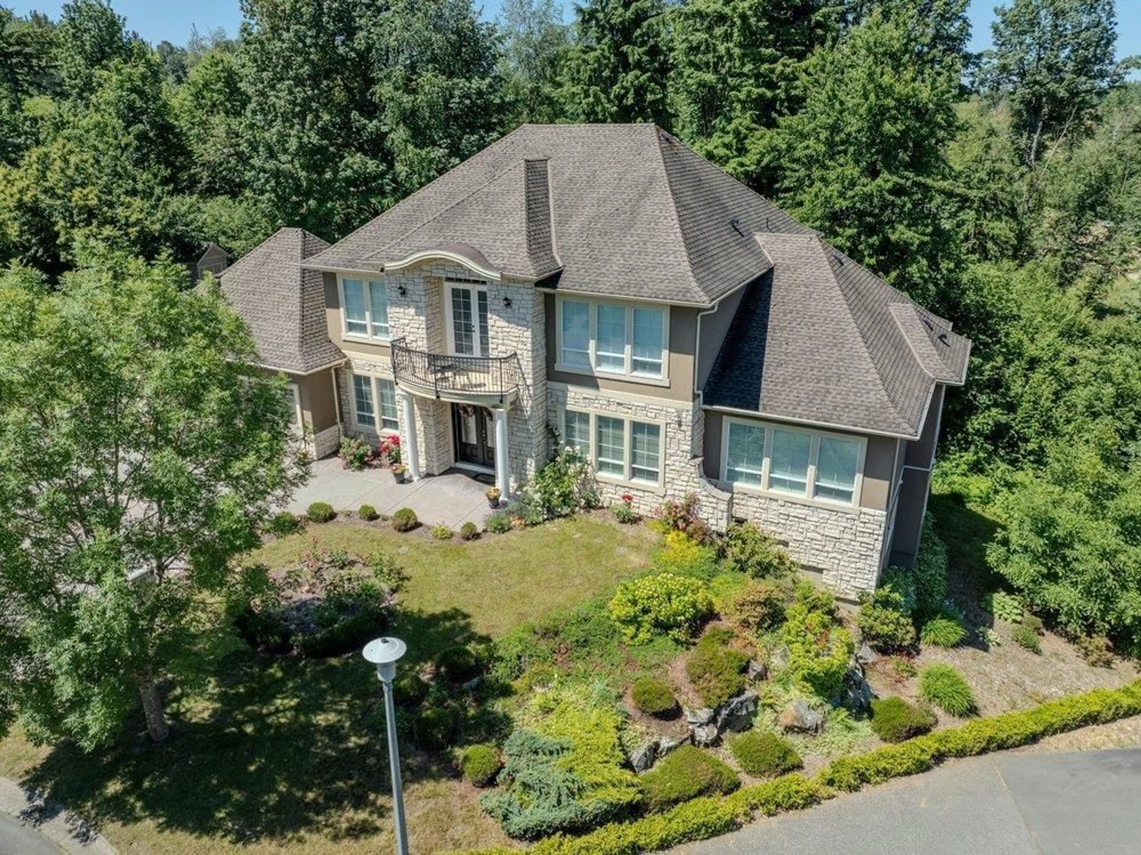 A pic from outside/outdoor area/front of a property/back of a property/a pic from drone, street for 8749 JONES TERRACE, Mission British Columbia V2V4X7