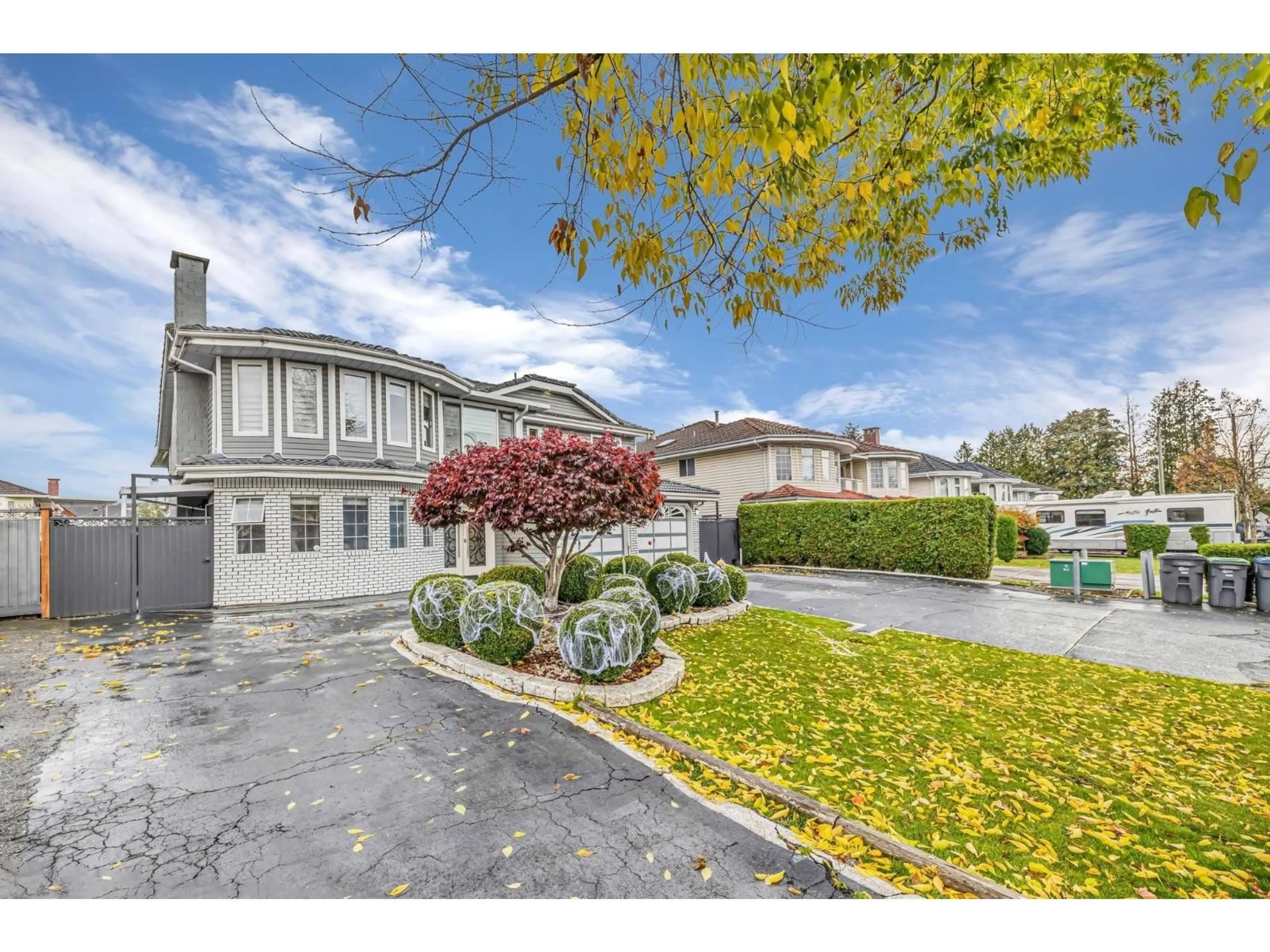 A pic from outside/outdoor area/front of a property/back of a property/a pic from drone, street for 12432 75 AVENUE, Surrey British Columbia V3W0R5