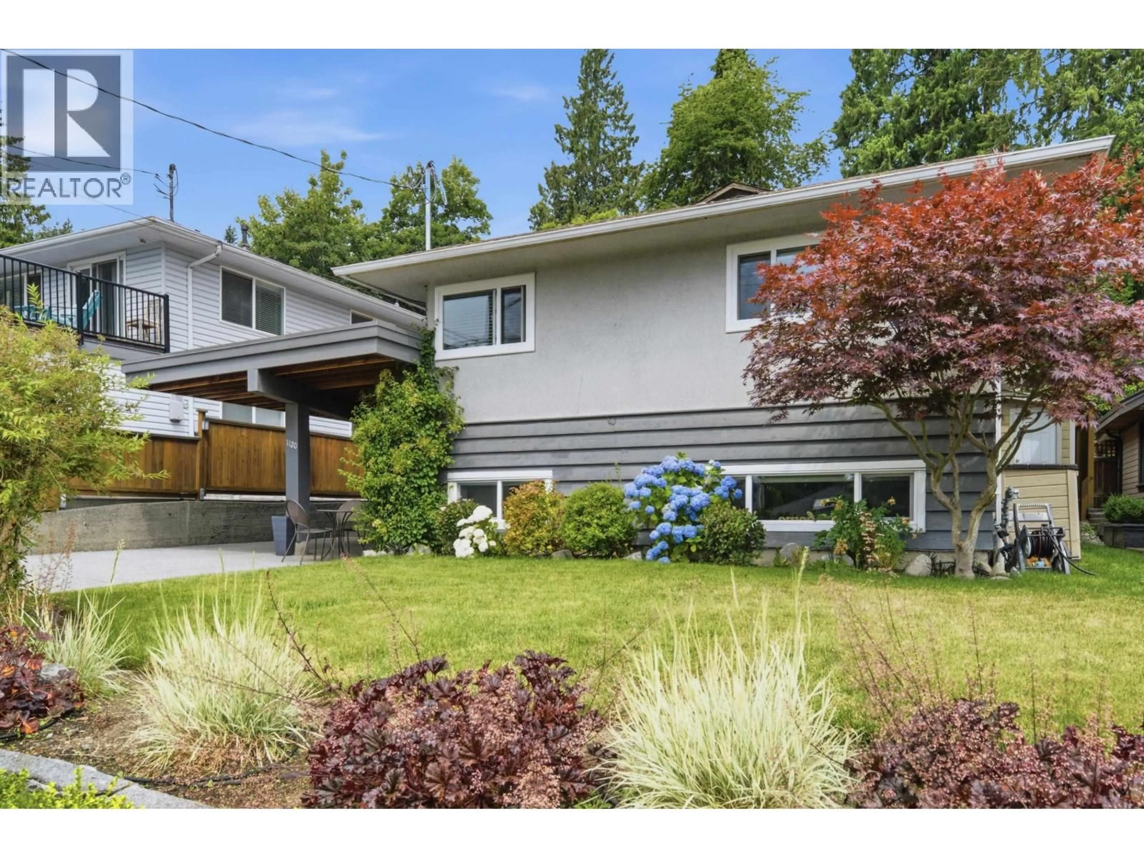 Home with vinyl exterior material, street for 1120 WELLINGTON DRIVE, North Vancouver British Columbia V7K1L2