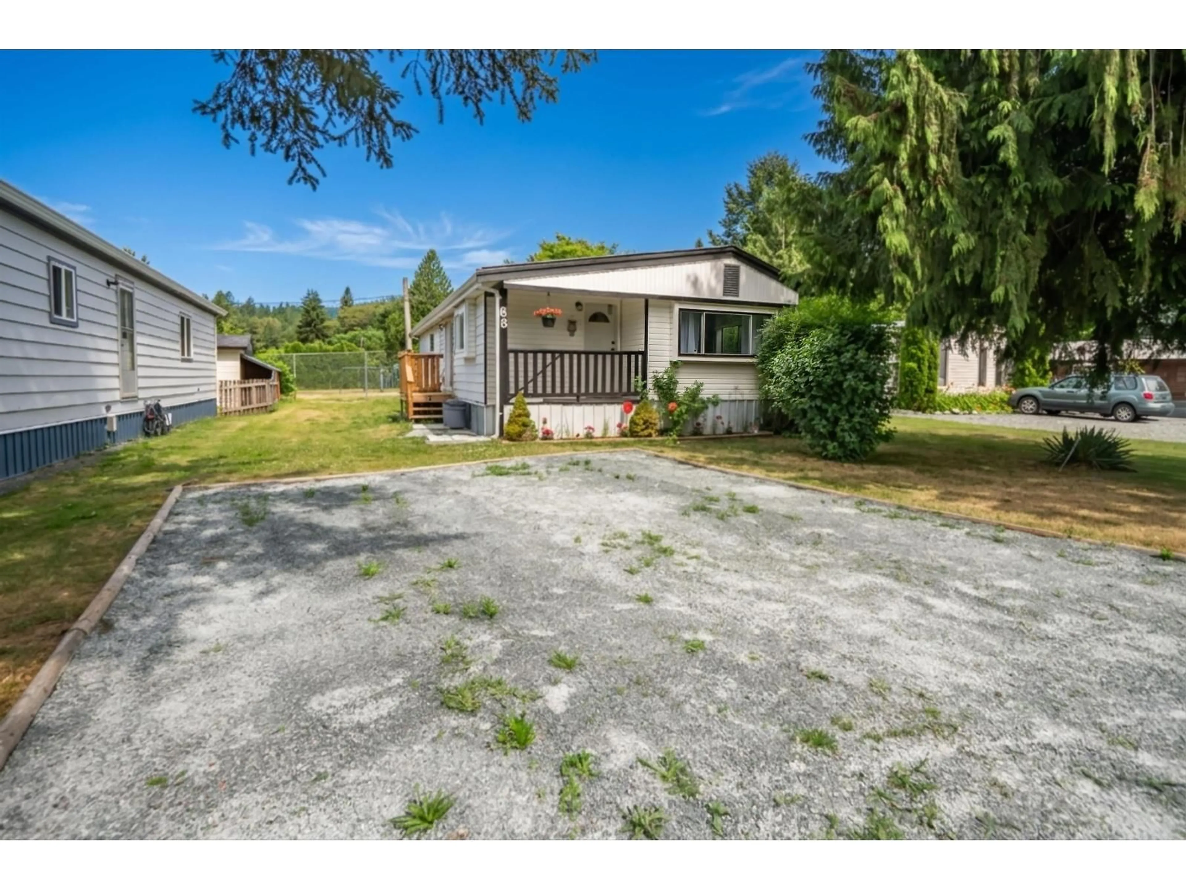 A pic from outside/outdoor area/front of a property/back of a property/a pic from drone, street for 68 - 3942 COLUMBIA VALLEY ROAD, Cultus Lake British Columbia V2R5B1