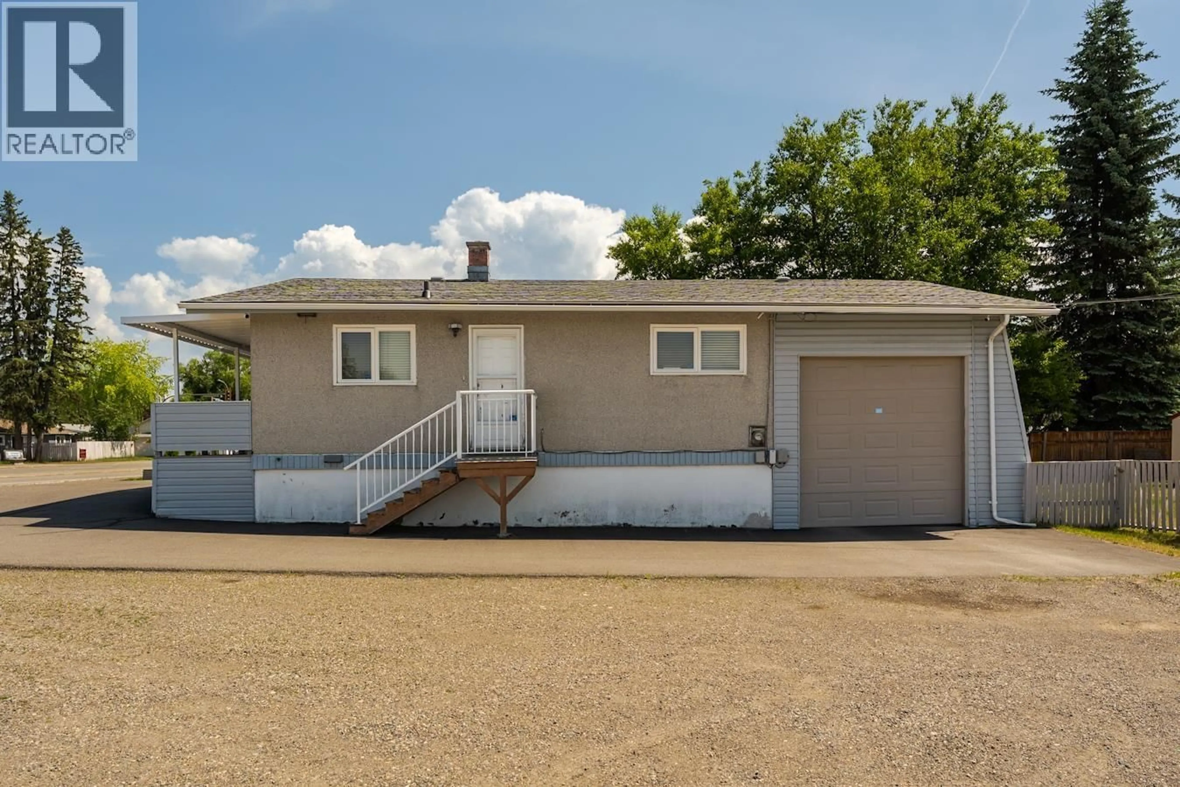 Home with vinyl exterior material, street for 2469 15TH AVENUE, Prince George British Columbia V2M1S5