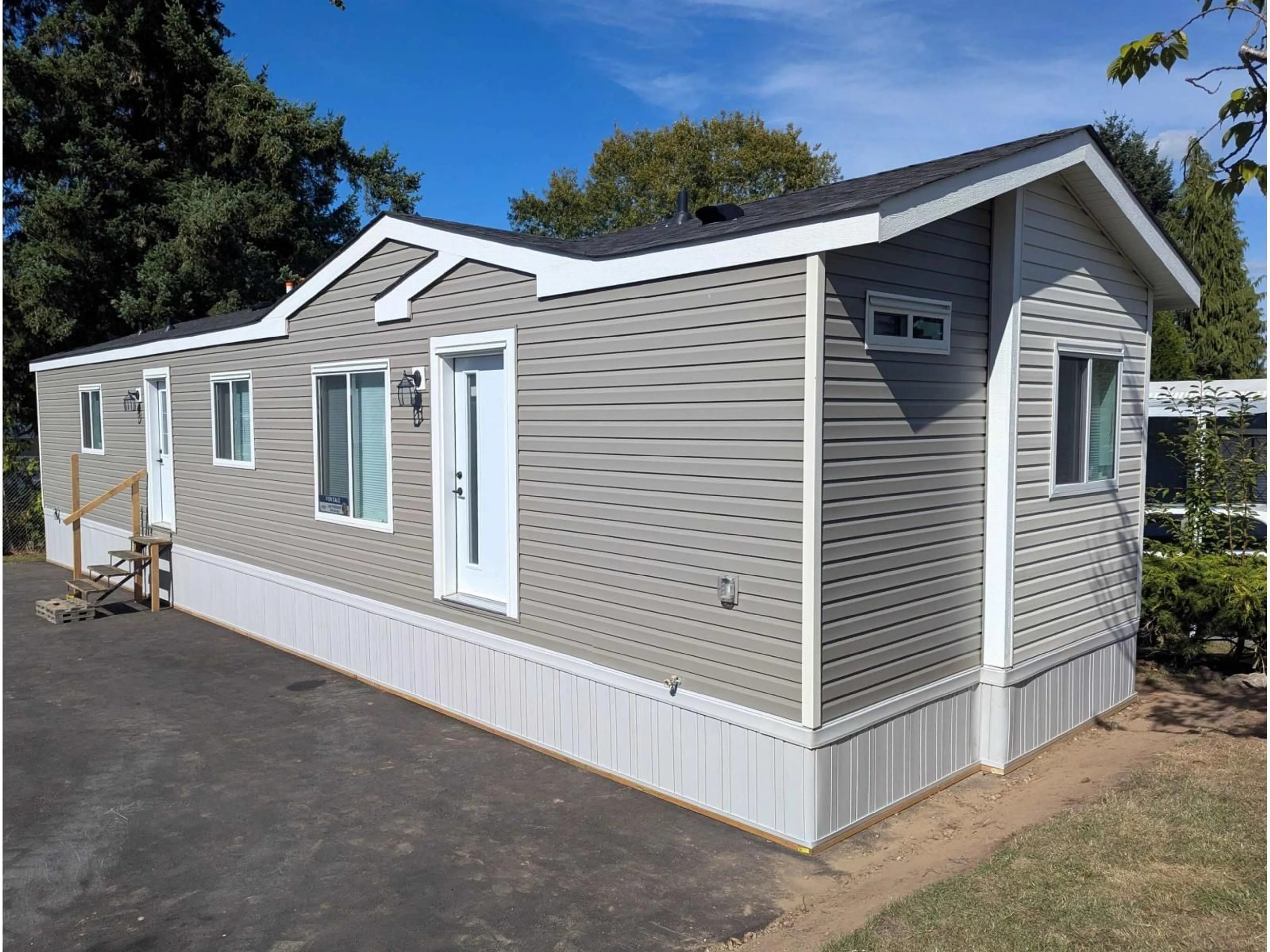 Home with vinyl exterior material, street for 104 - 8220 KING GEORGE BOULEVARD, Surrey British Columbia V3W6B1
