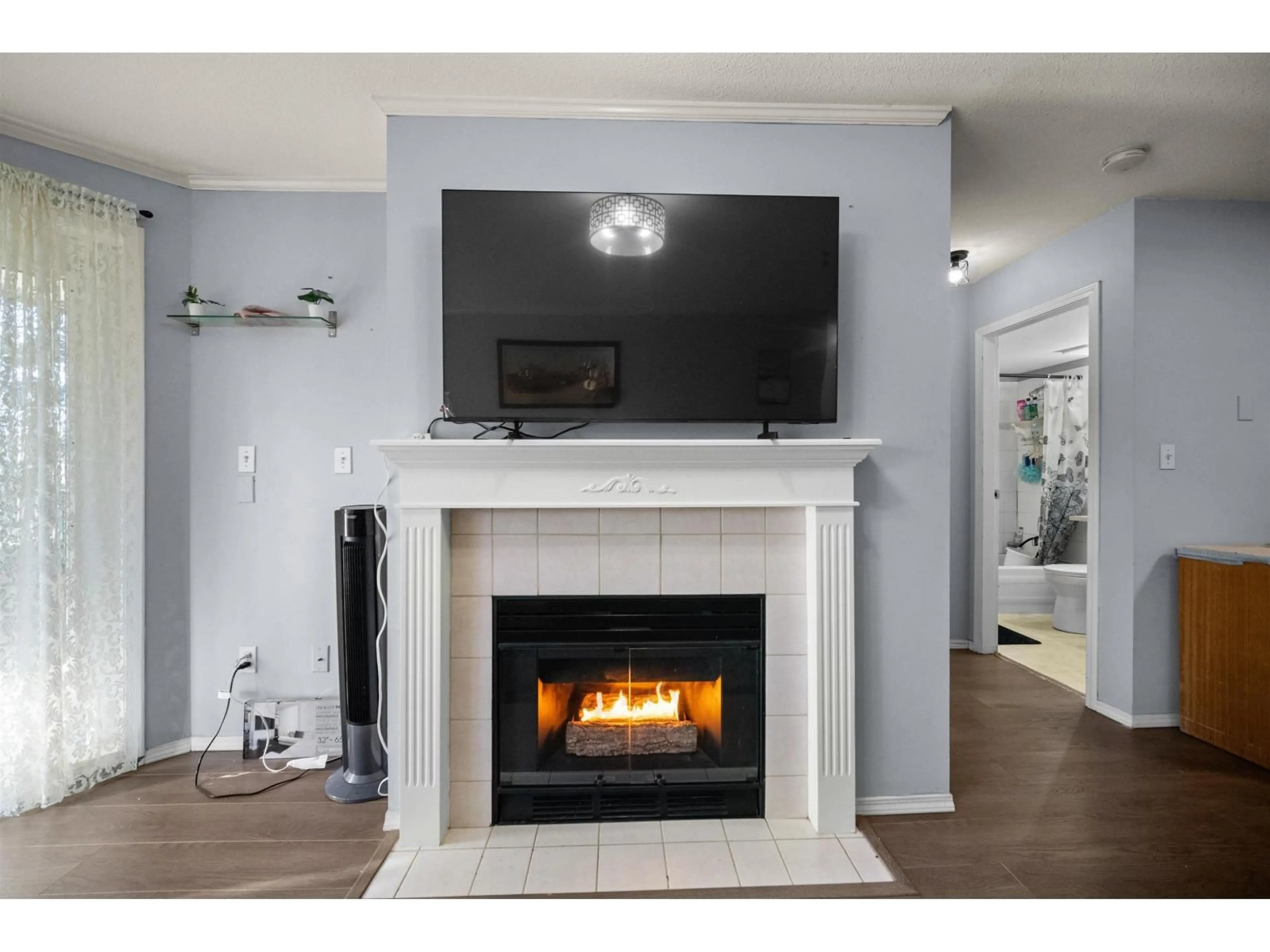 Home theater for 207 - 2962 TRETHEWEY STREET, Abbotsford British Columbia V2T4M3