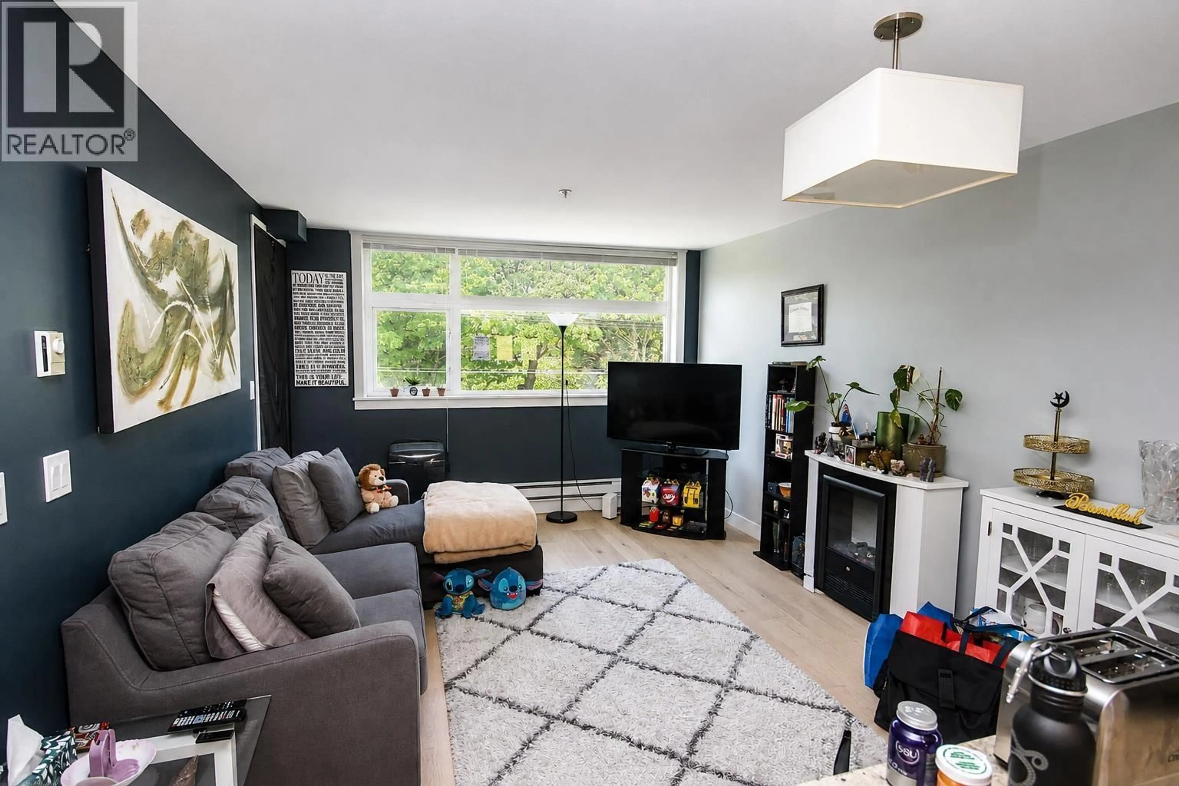 Living room with furniture, unknown for 205 - 5488 CECIL STREET, Vancouver British Columbia V5R4E5