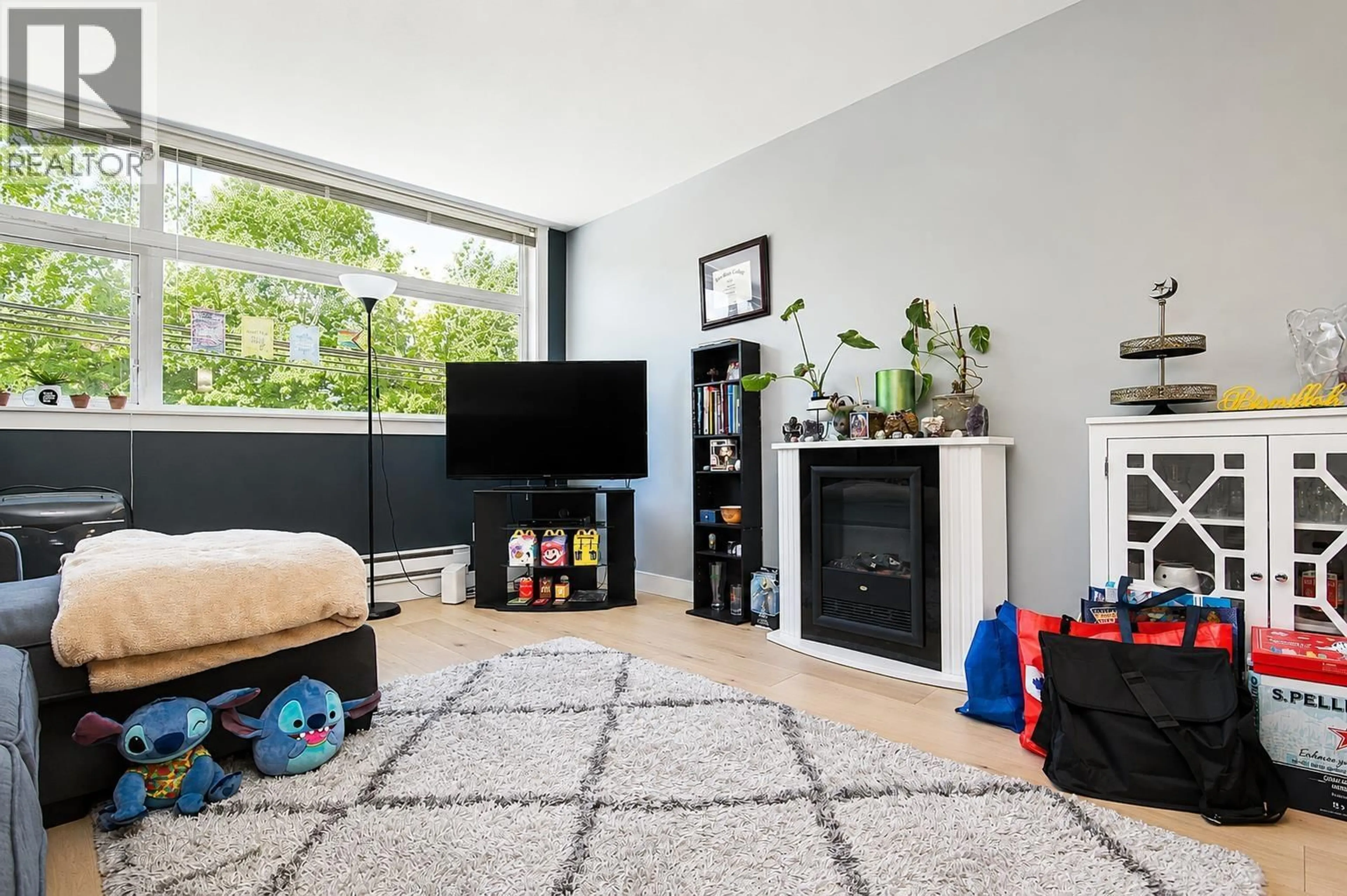 Living room with furniture, unknown for 205 - 5488 CECIL STREET, Vancouver British Columbia V5R4E5