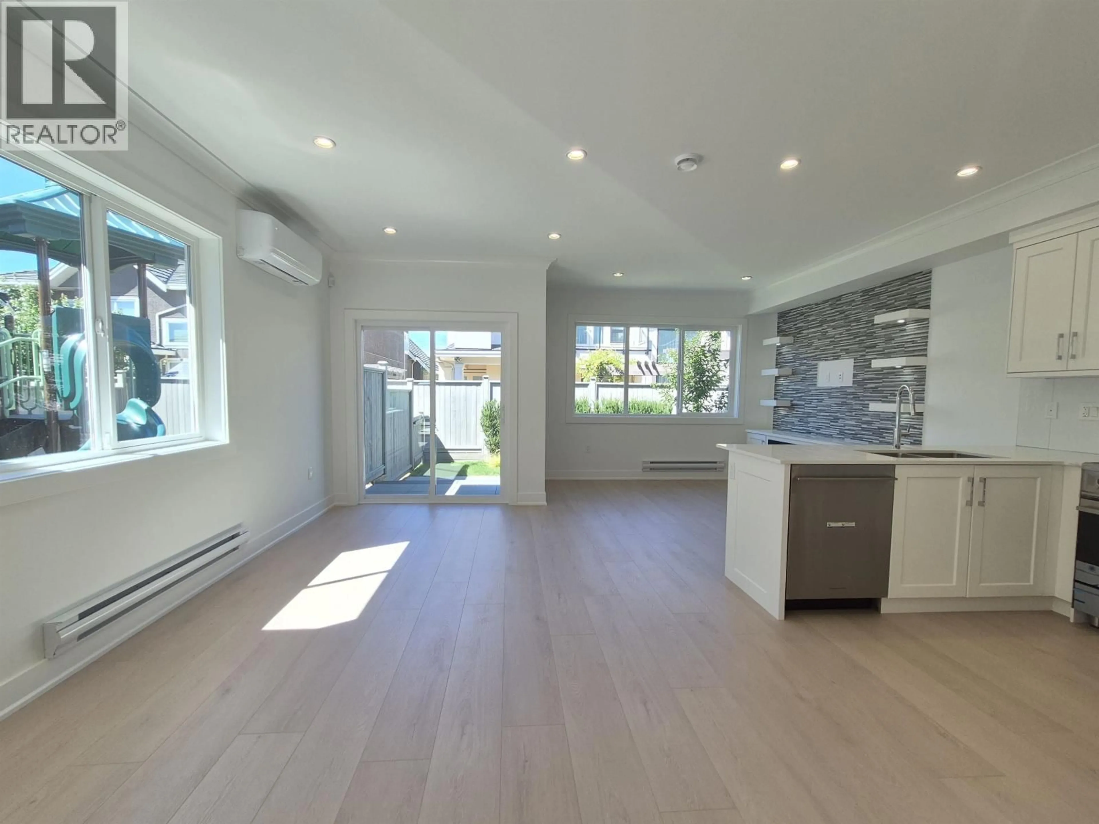 Open concept kitchen, unknown for 102 - 8233 WILLIAMS ROAD, Richmond British Columbia V7A1G4