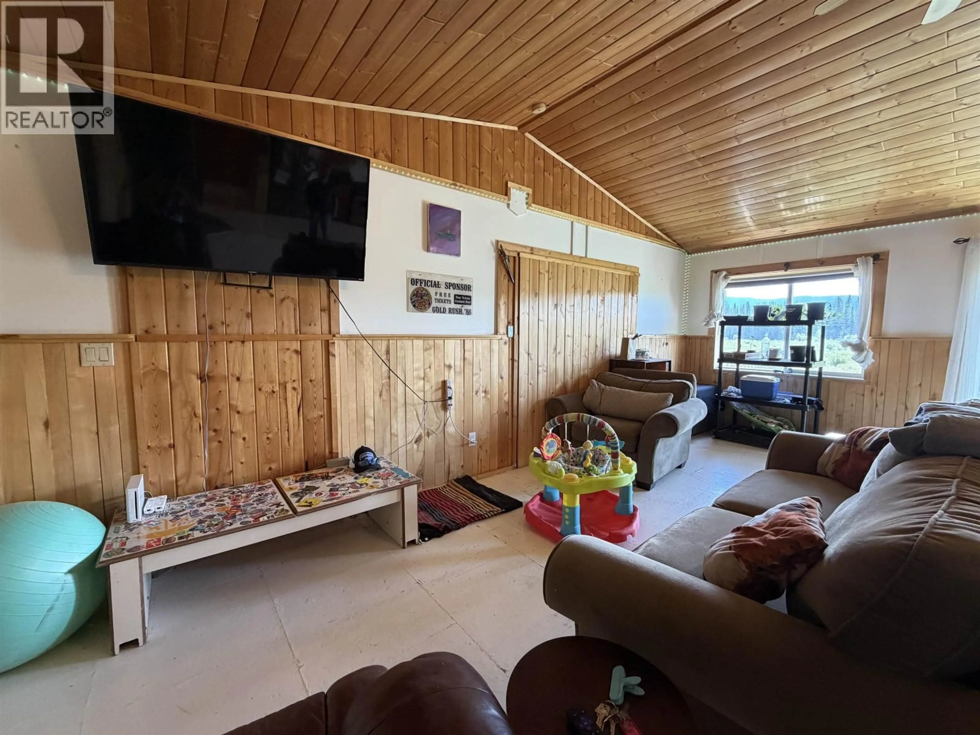 Living room with furniture, wood/laminate floor for 6481 BLACK CREEK ROAD, Horsefly British Columbia V0L1L0