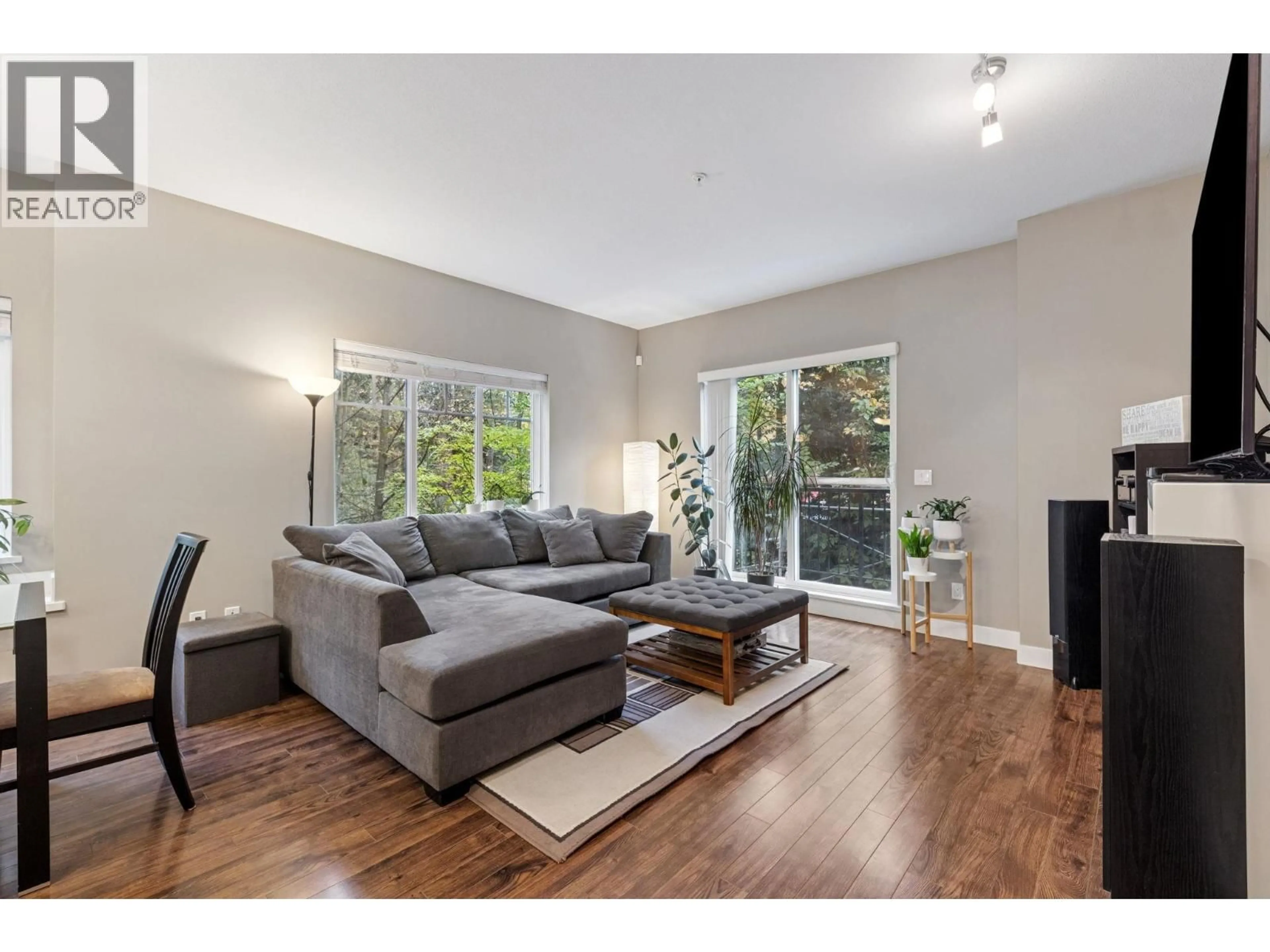 Living room with furniture, wood/laminate floor for 207 - 3888 NORFOLK STREET, Burnaby British Columbia V5G1E5