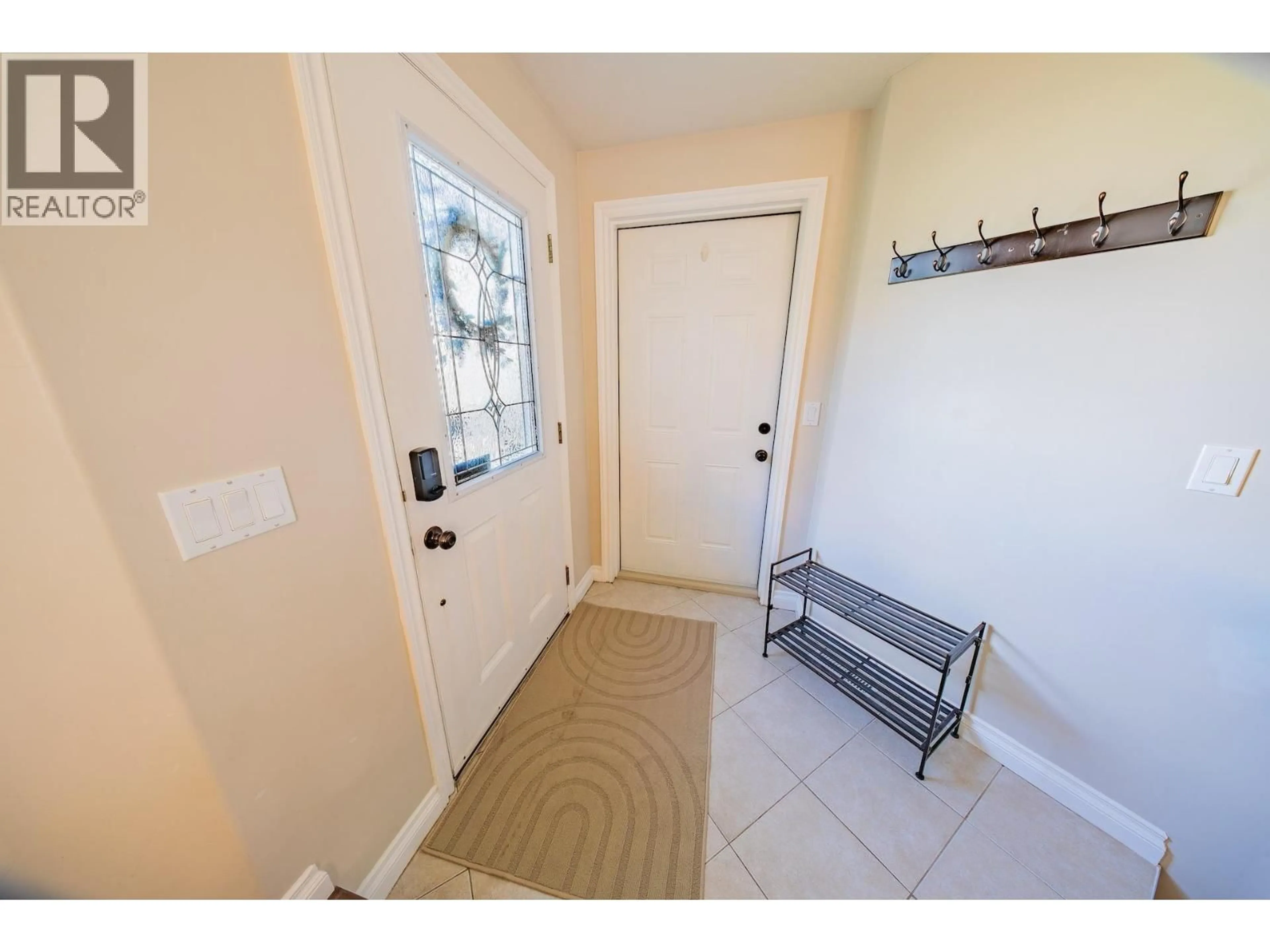 Indoor entryway for 8615 113 AVENUE, Fort St. John British Columbia V1J0E2