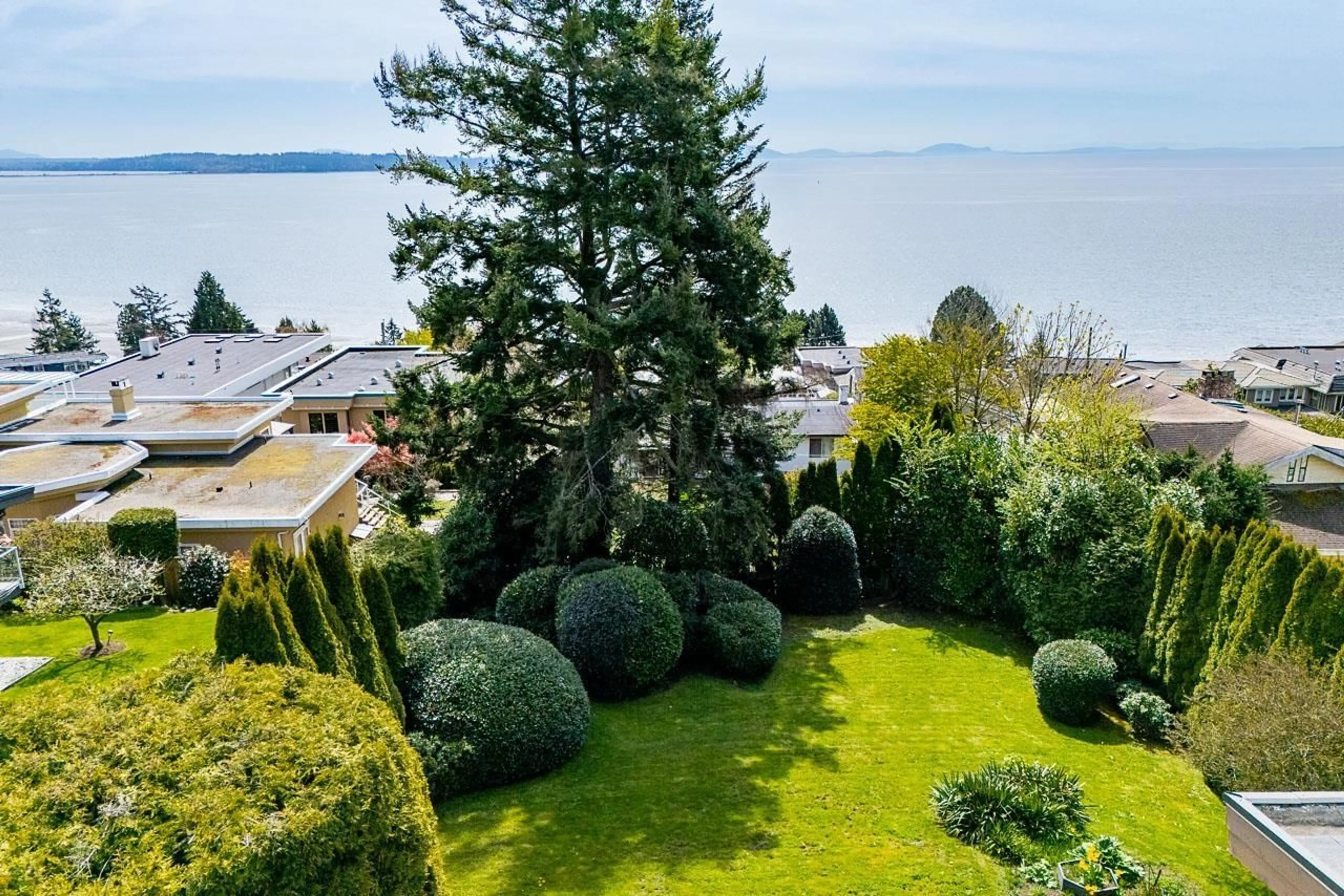 A pic from outside/outdoor area/front of a property/back of a property/a pic from drone, water/lake/river/ocean view for 14366 MAGDALEN AVENUE, White Rock British Columbia V4B2X3