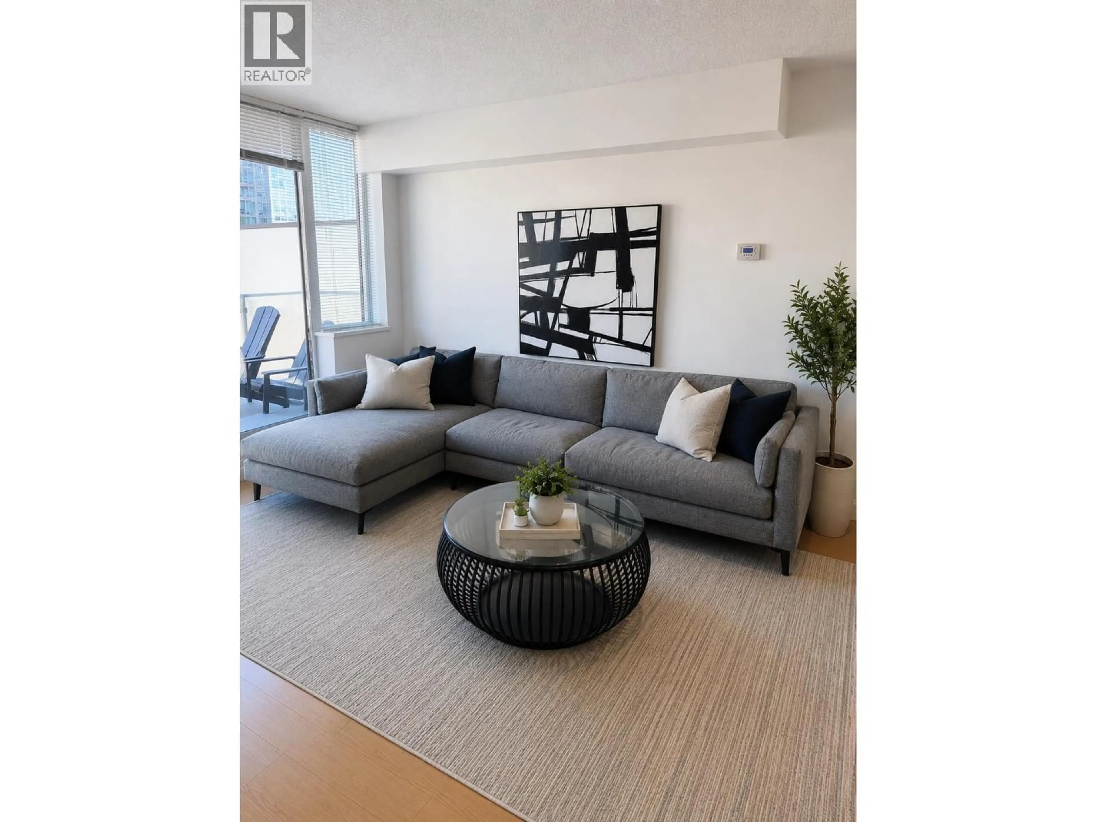Living room with furniture, unknown for 702 - 1325 ROLSTON STREET, Vancouver British Columbia V6B0M2