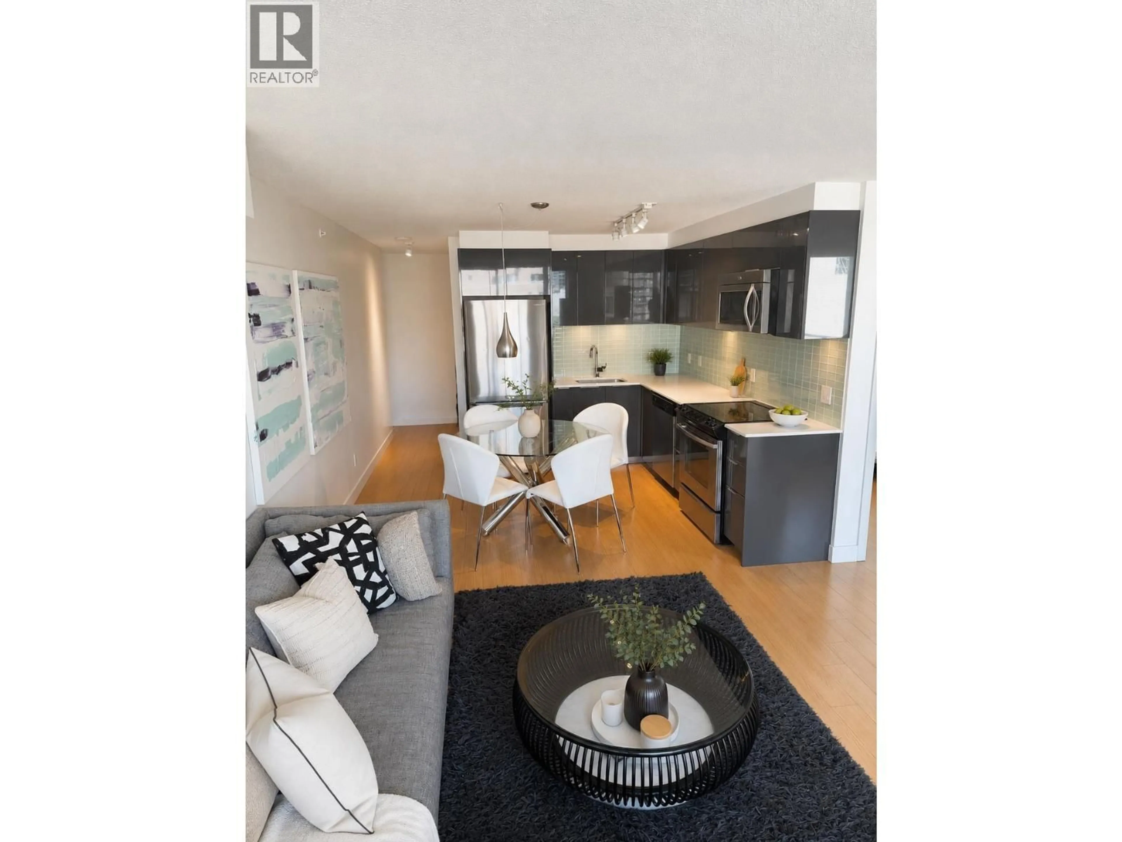 Open concept kitchen, wood/laminate floor for 702 - 1325 ROLSTON STREET, Vancouver British Columbia V6B0M2