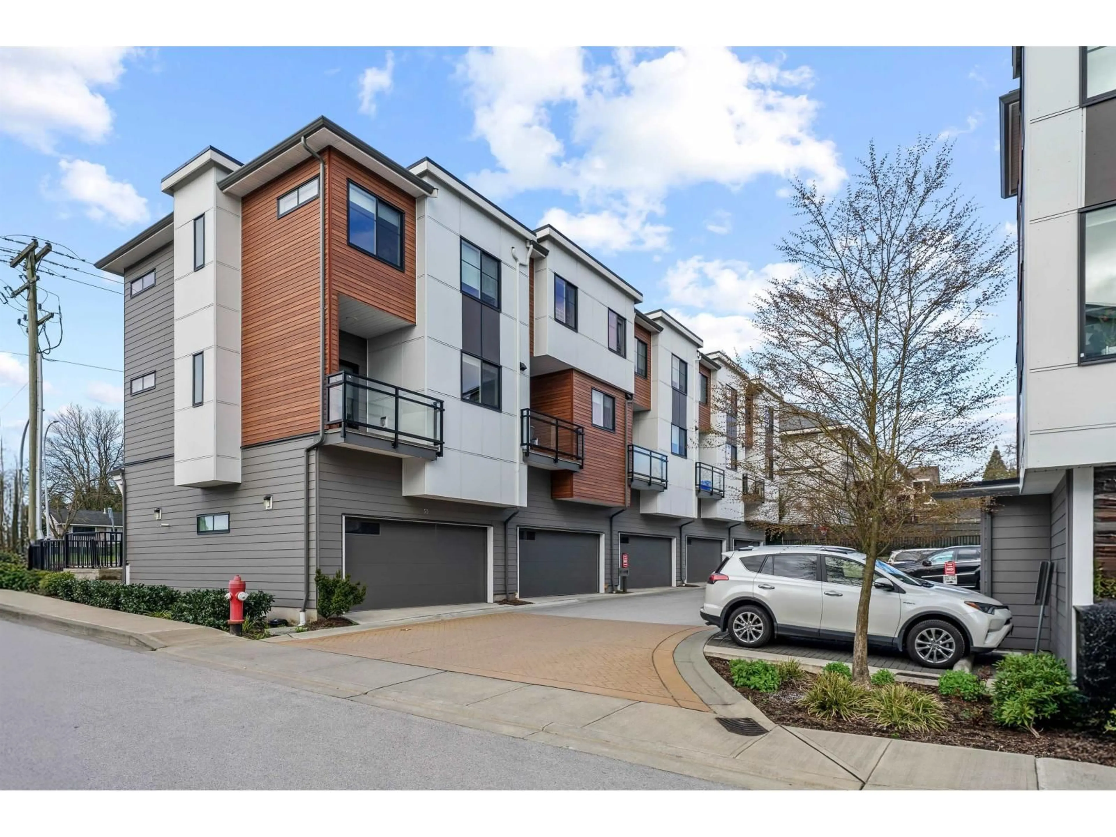 A pic from outside/outdoor area/front of a property/back of a property/a pic from drone, street for 56 - 1639 162 STREET, Surrey British Columbia V4A4Y1