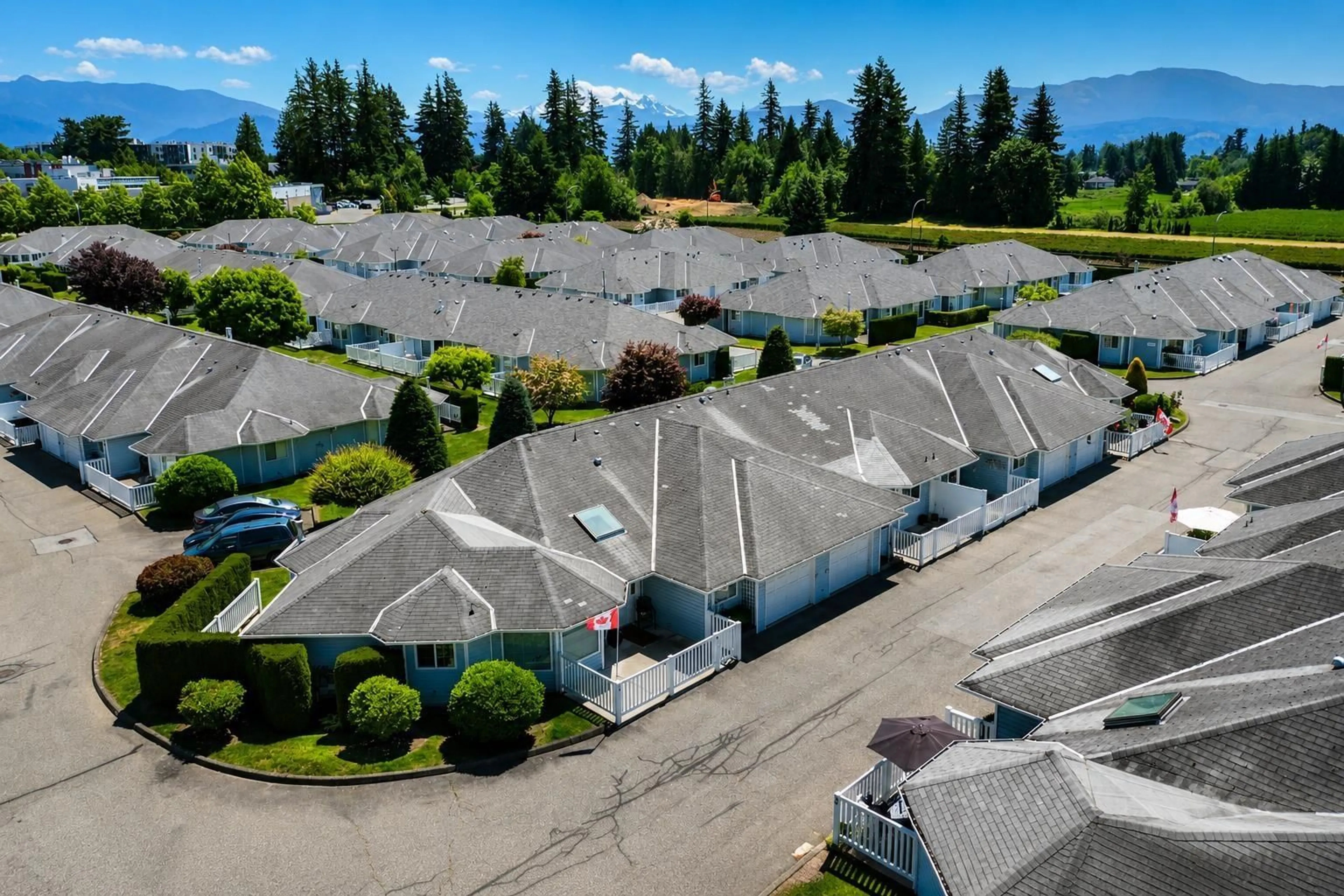 A pic from outside/outdoor area/front of a property/back of a property/a pic from drone, mountain view for 89 - 1450 MCCALLUM ROAD, Abbotsford British Columbia V2S8A3