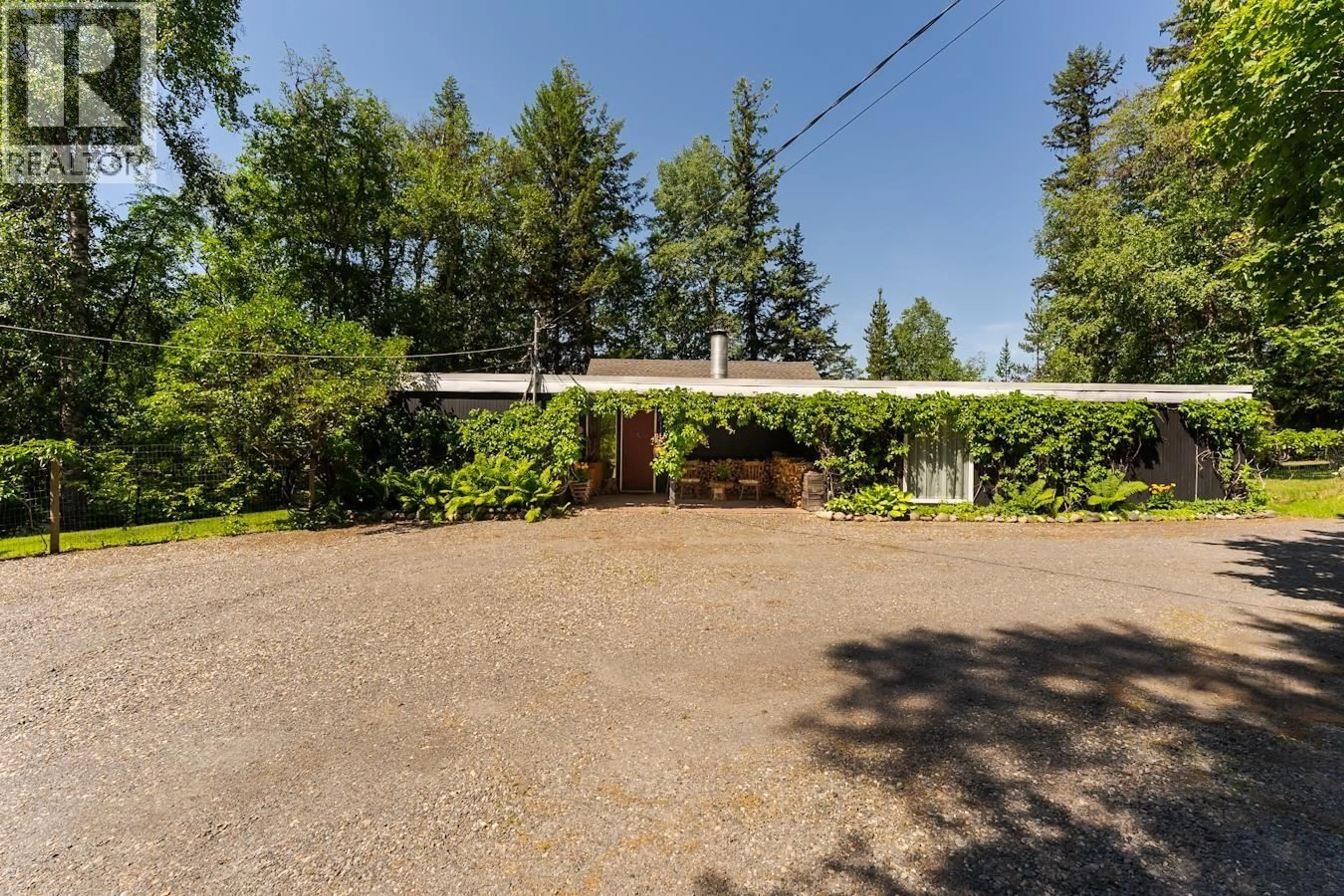 A pic from outside/outdoor area/front of a property/back of a property/a pic from drone, unknown for 8307 TOOMBS DRIVE, Prince George British Columbia V2K5A3