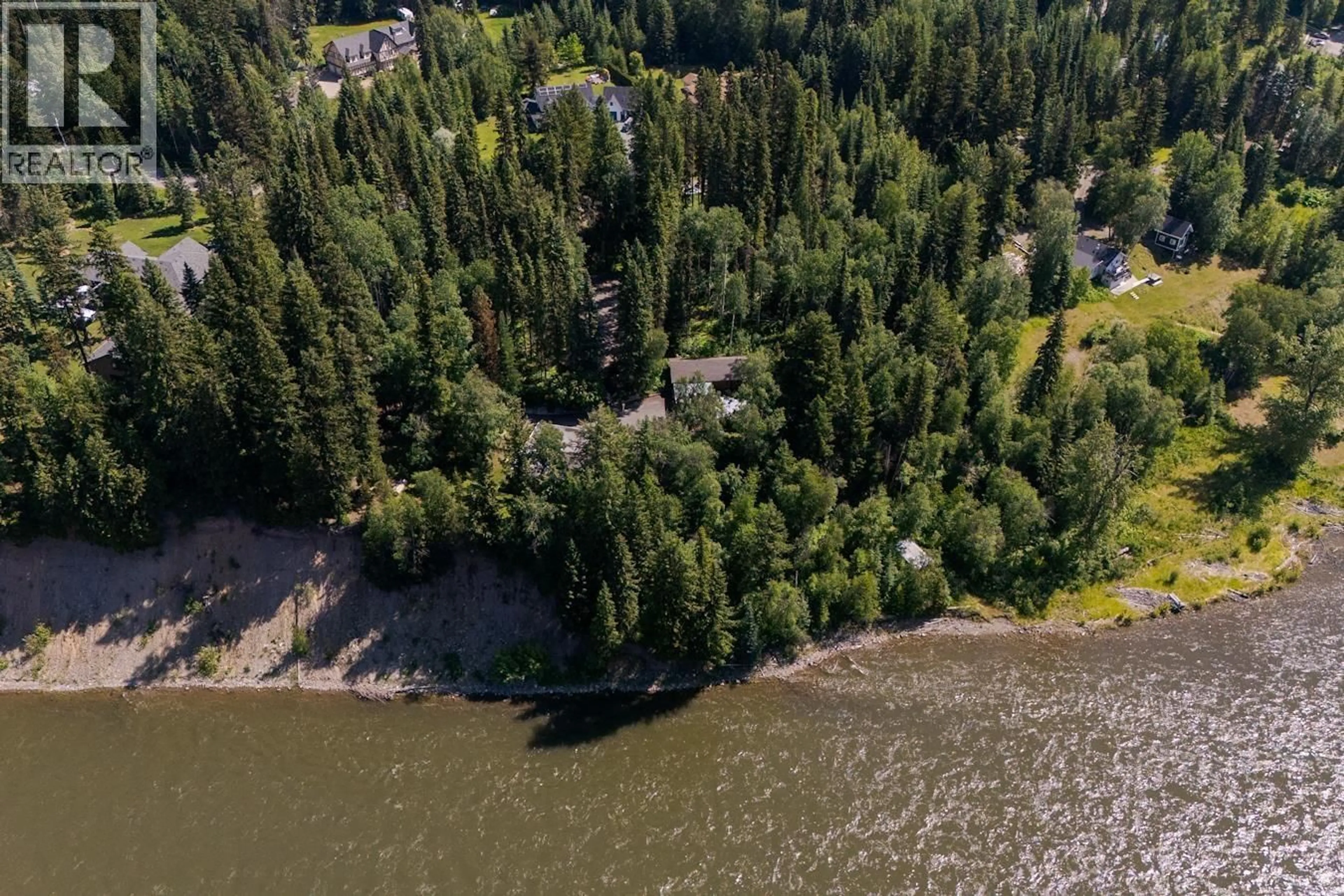 A pic from outside/outdoor area/front of a property/back of a property/a pic from drone, water/lake/river/ocean view for 8307 TOOMBS DRIVE, Prince George British Columbia V2K5A3