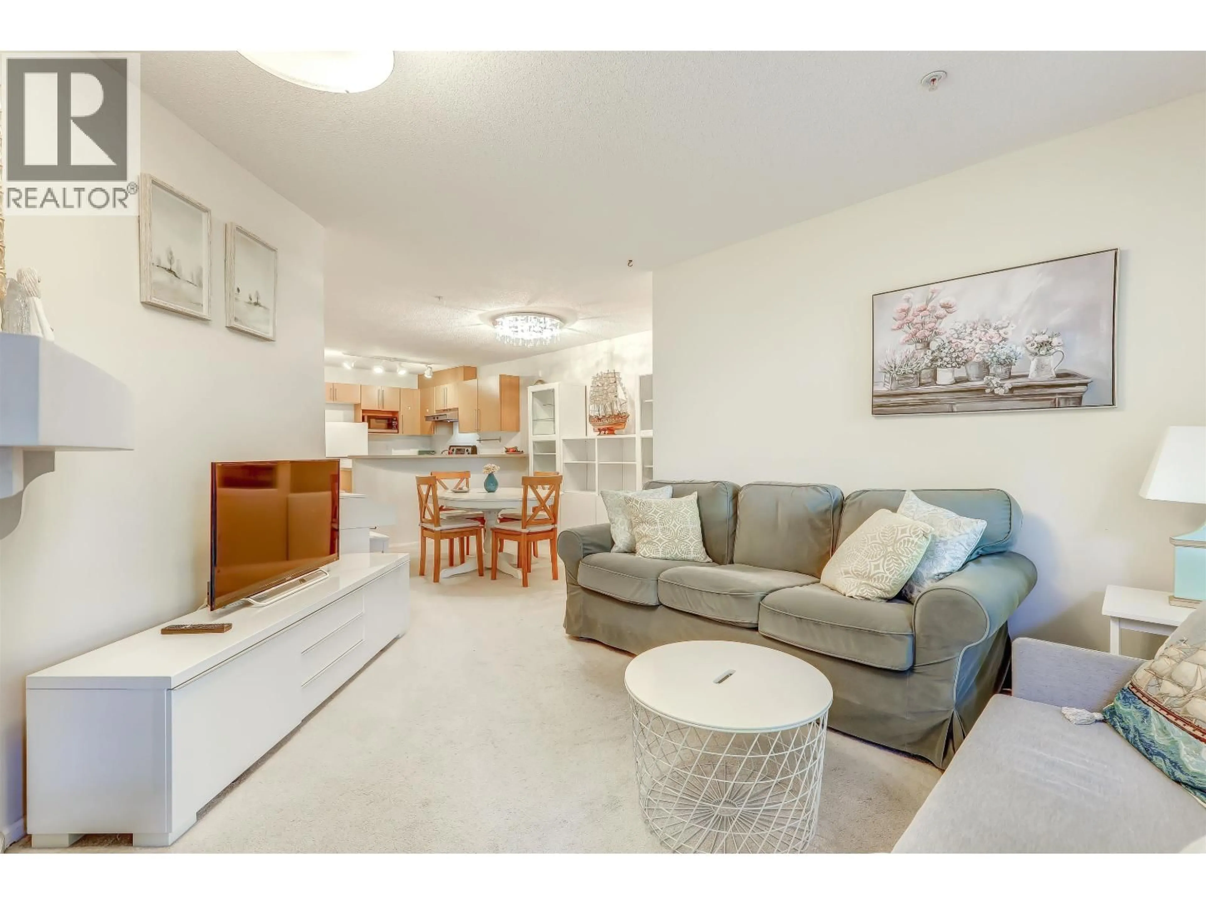 Living room with furniture, unknown for 208 - 1150 29TH STREET, North Vancouver British Columbia V7K3E2