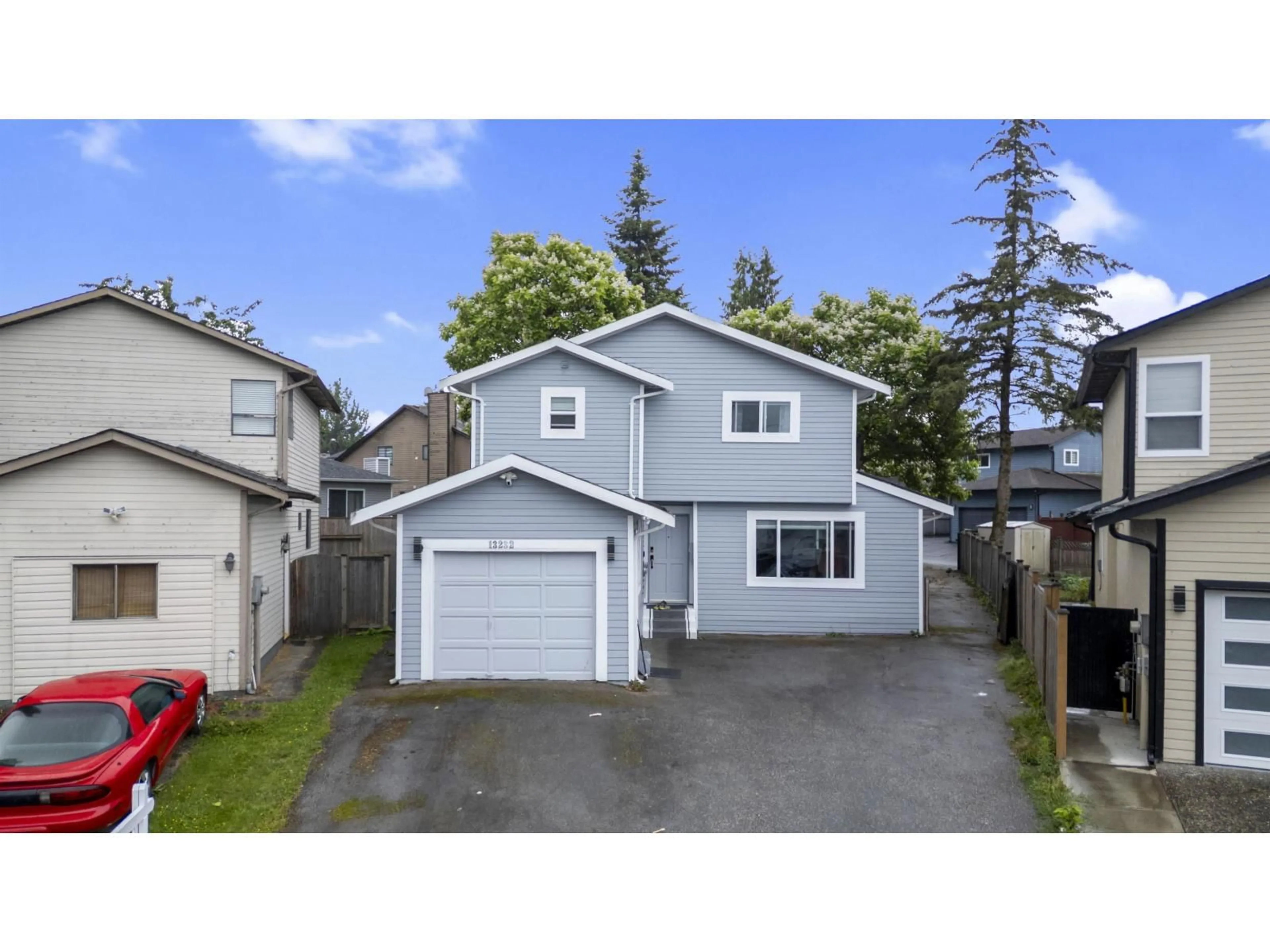 Home with vinyl exterior material, street for 13232 82 AVENUE, Surrey British Columbia V3W8Z4